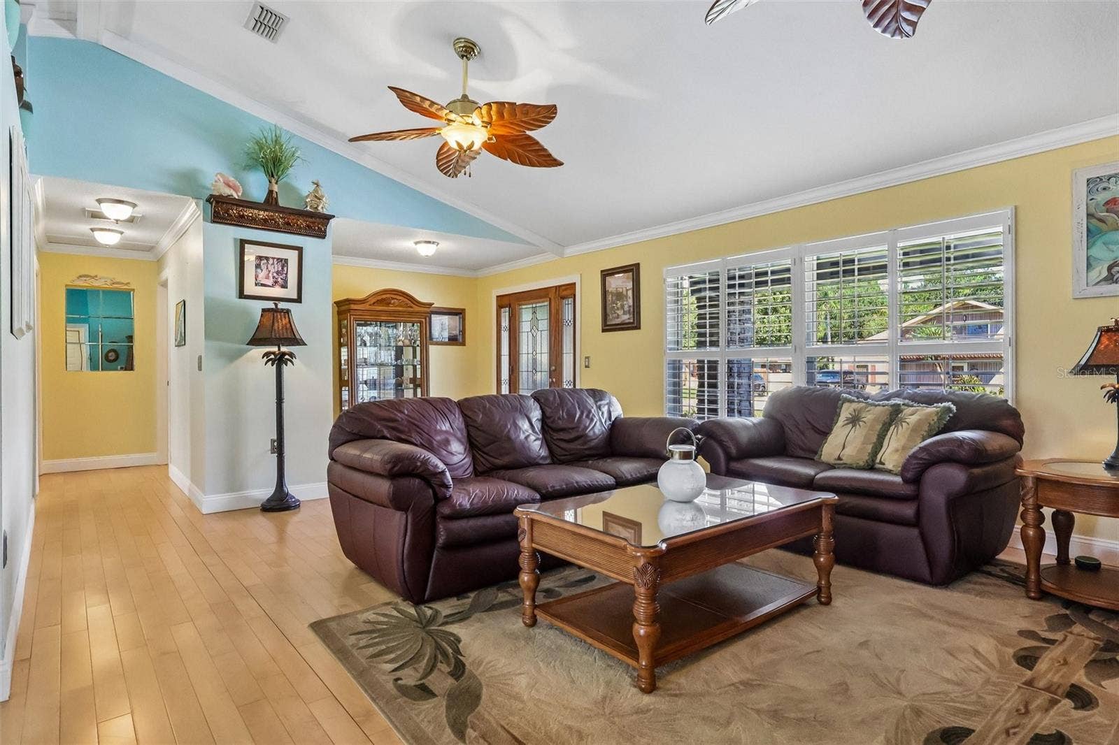 28116 LOIS DRIVE, Tavares, FL 32778 Split floor plan, Hallway to 2 bedrooms and modern and upgraded guest bath