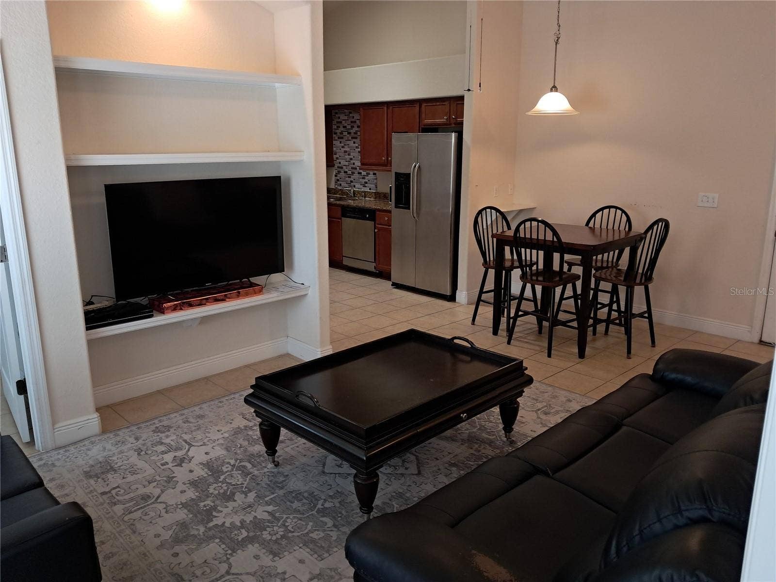 1083 DAVID WALKER DRIVE, #C3, Tavares, FL 32778 Living room to kitchen