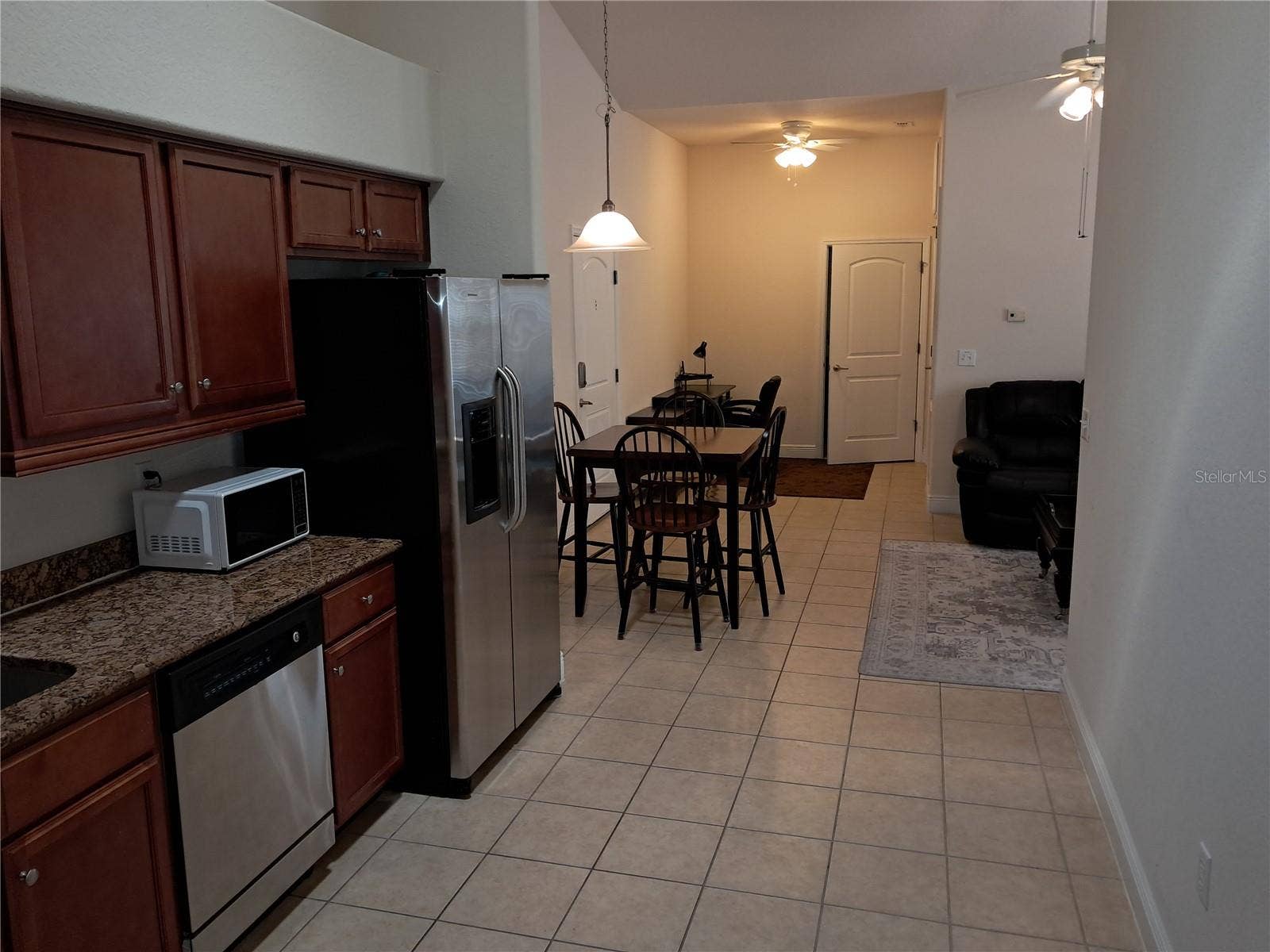 1083 DAVID WALKER DRIVE, #C3, Tavares, FL 32778 Kitchen to dinning to den