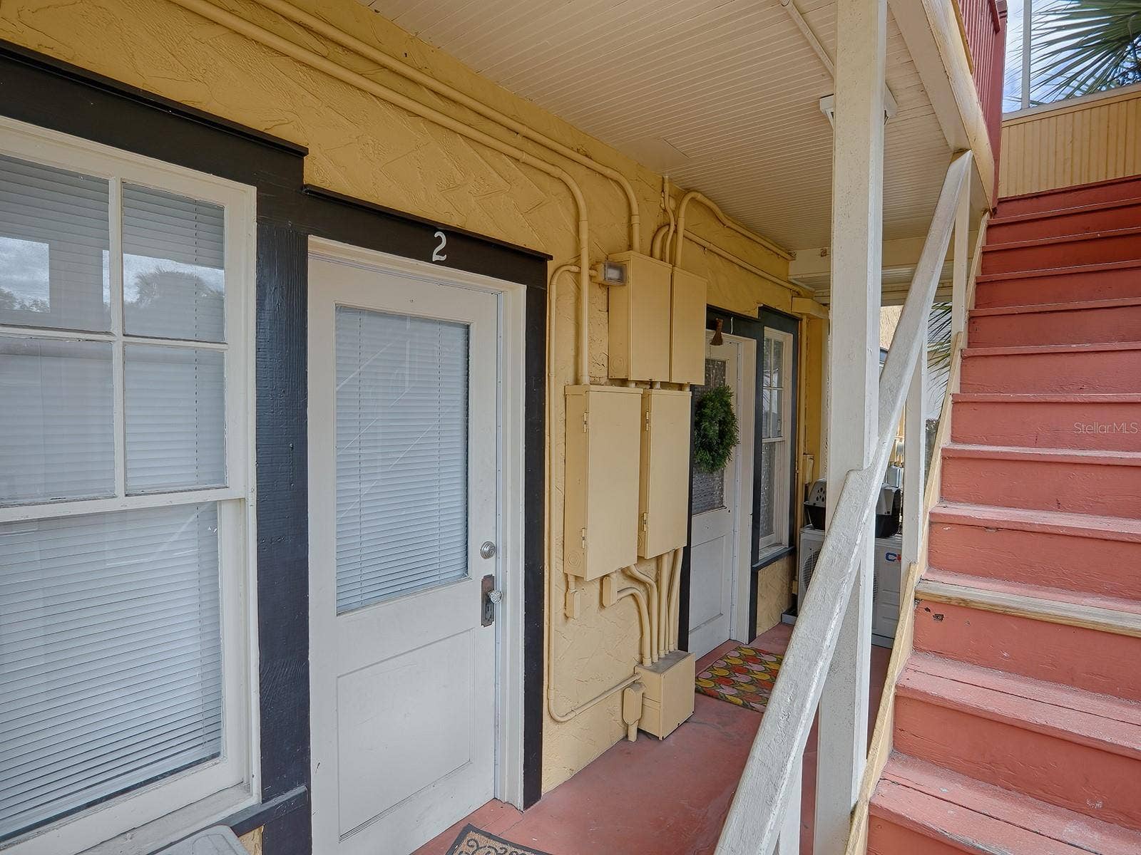 422 & 426 E CITRUS AVENUE, Eustis, FL 32726 426_Exterior Rear Doors & Staircase
