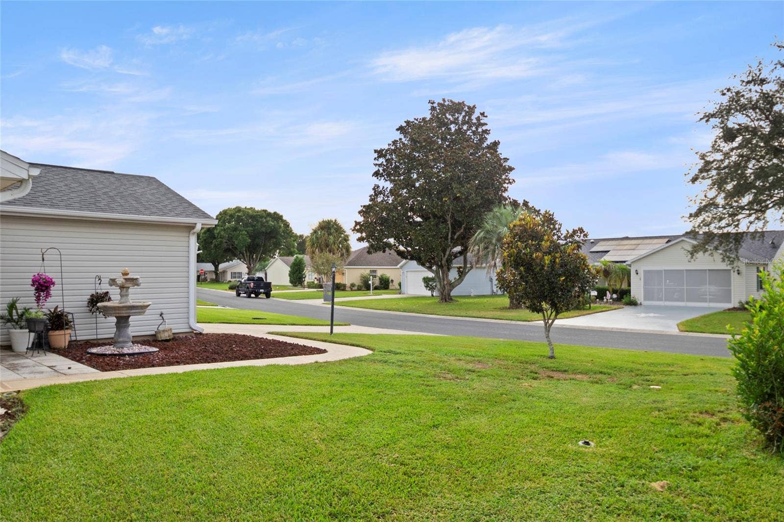 672 SAN PEDRO DRIVE, The Villages, FL 32159 Front yard view.