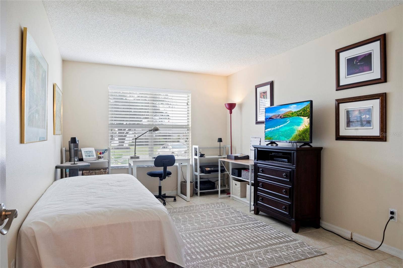 672 SAN PEDRO DRIVE, The Villages, FL 32159 Guest Bedroom, Office, Craft Room, tile floor and closet.