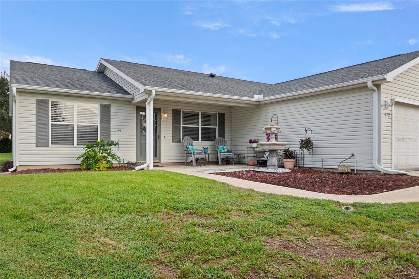 672 SAN PEDRO DRIVE, The Villages, FL 32159 Relax on the front porch.