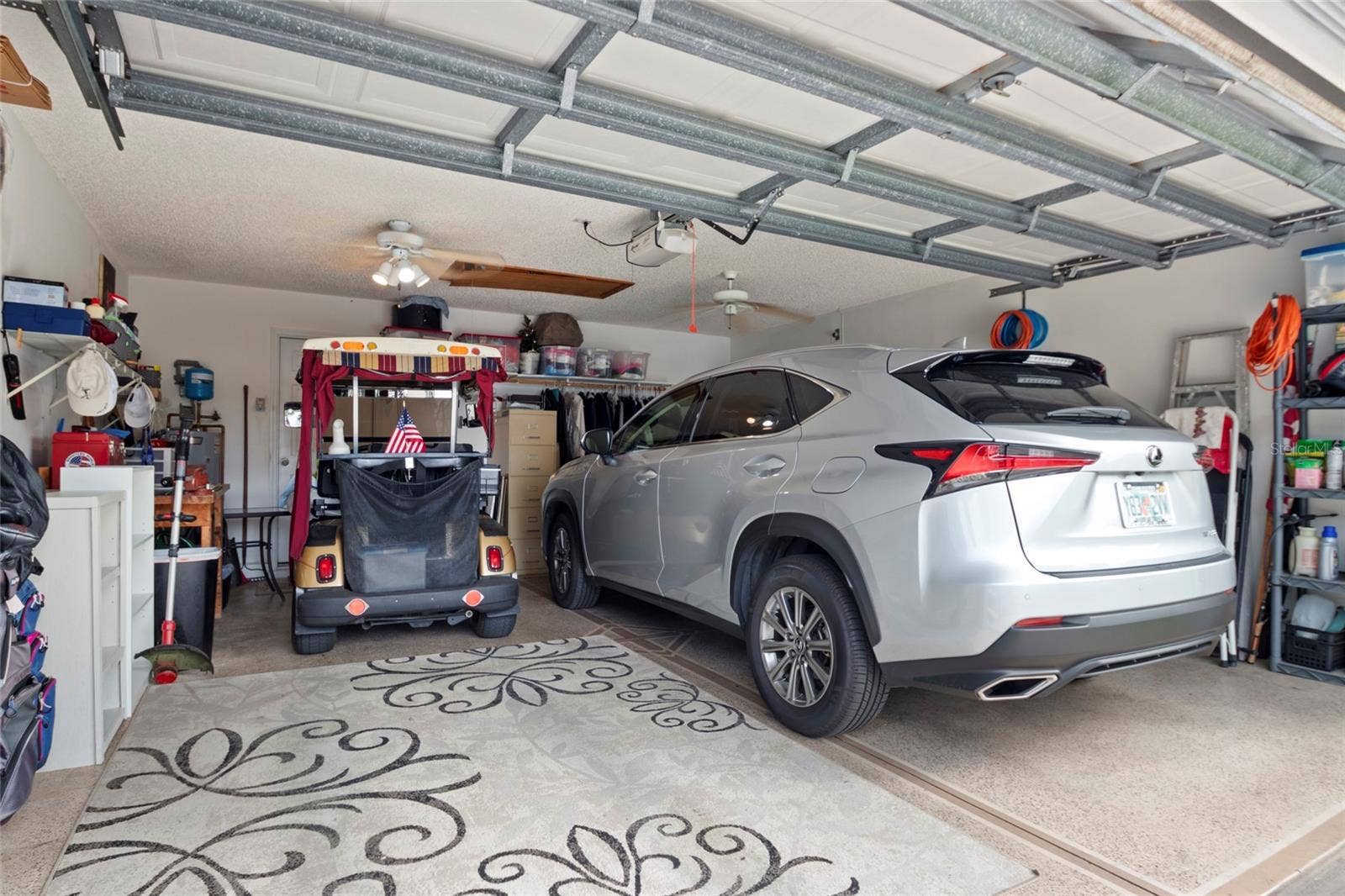 672 SAN PEDRO DRIVE, The Villages, FL 32159 Garage has room for a vehicle and two golf carts.