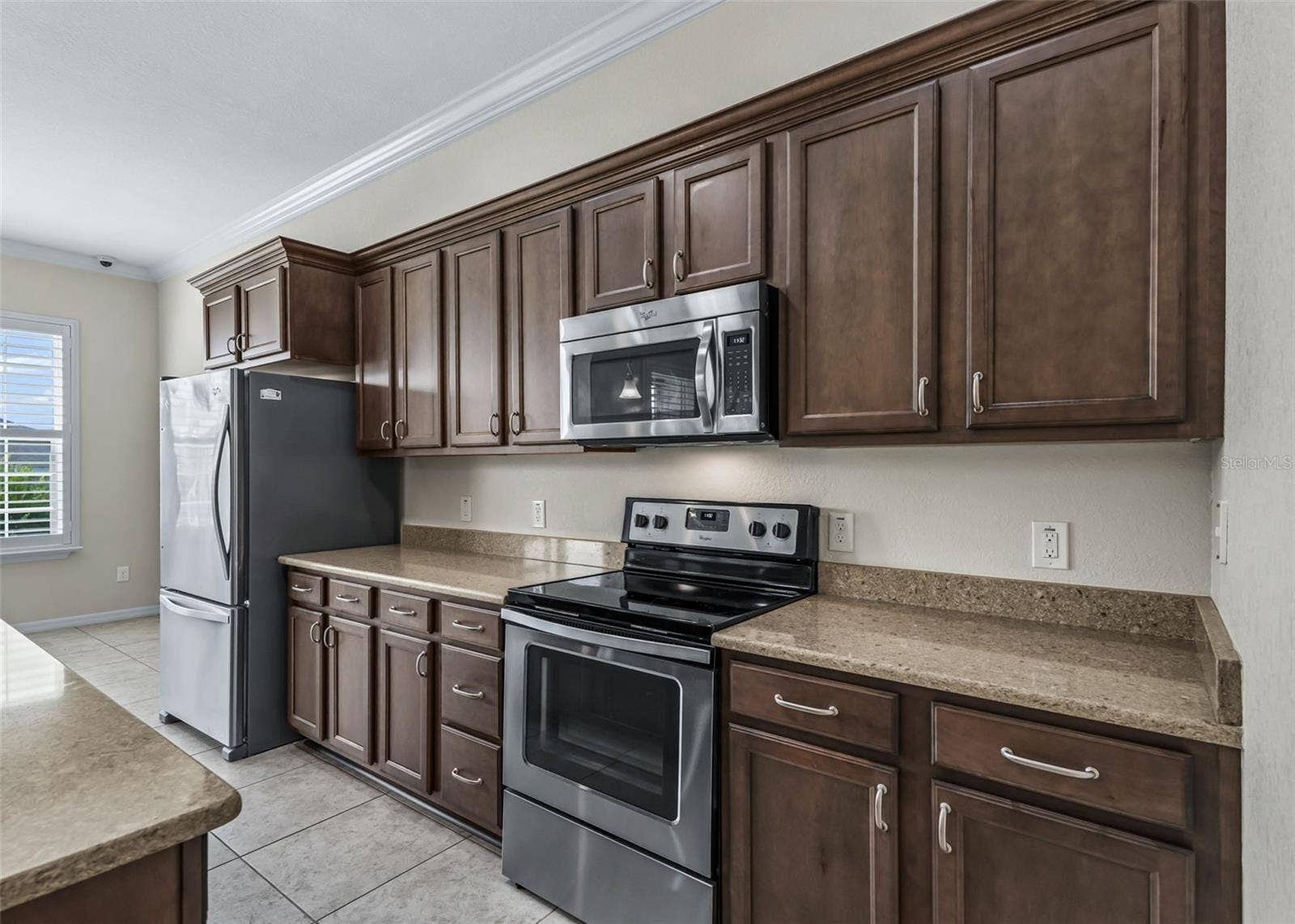 Solid Wood Cabinetry & Stainless Appliances