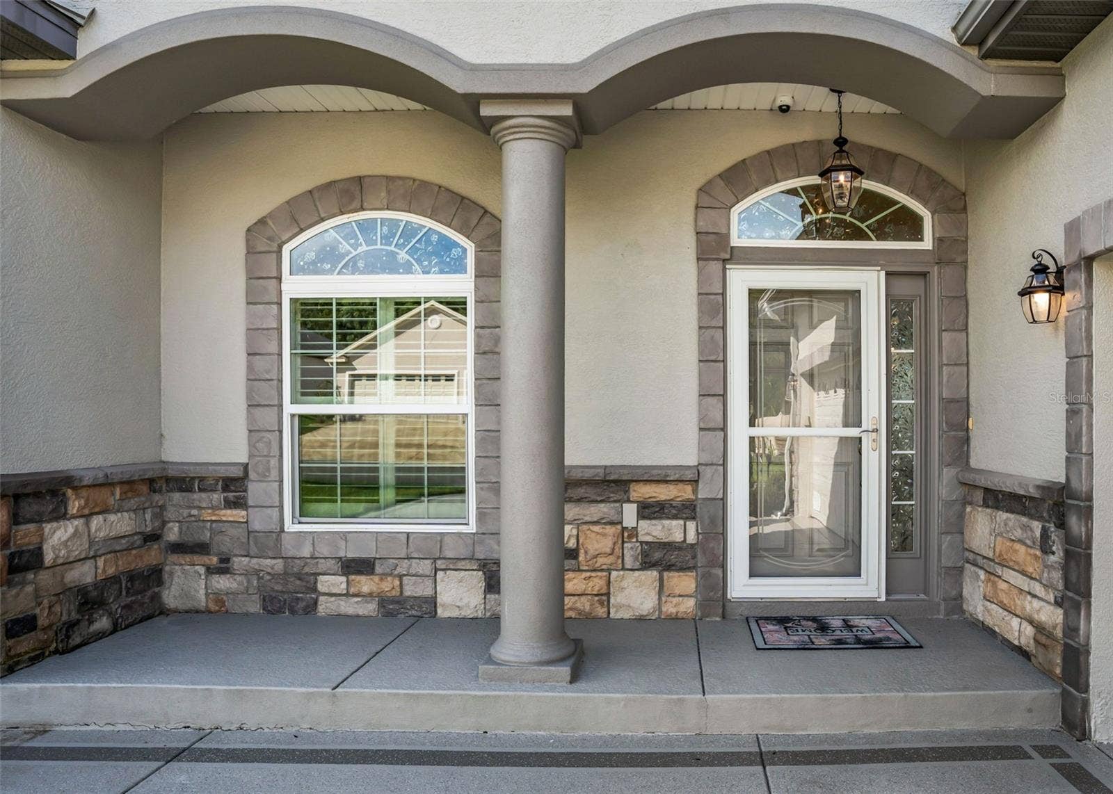 Covered Front Entry w/Storm door & Sidelight accent