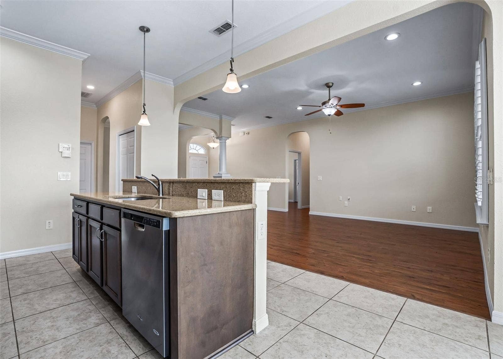 Kitchen opens to living area