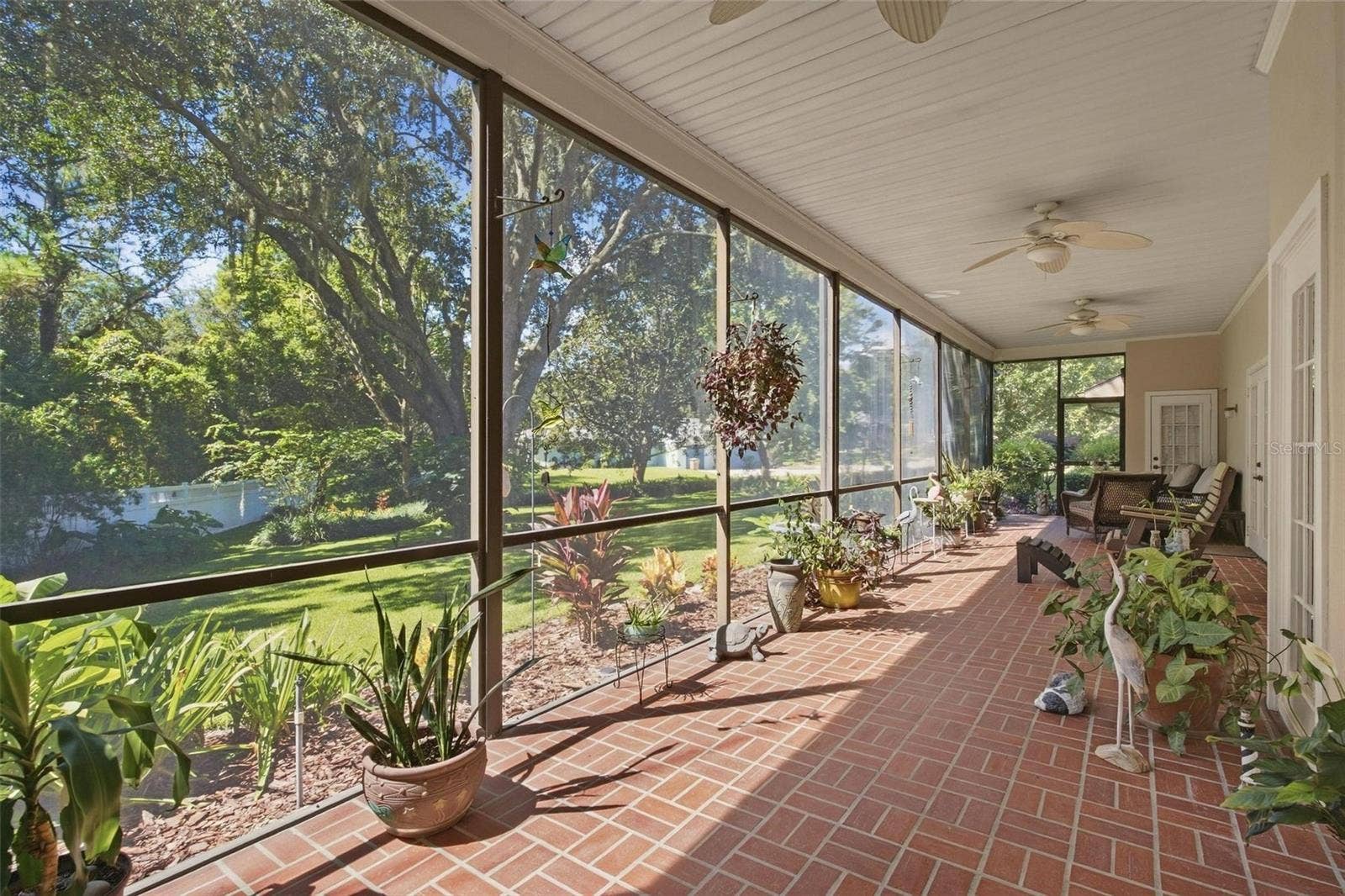 8732 SPRING COURT, Leesburg, FL 34788 50x9 extended screened enclosed lanai