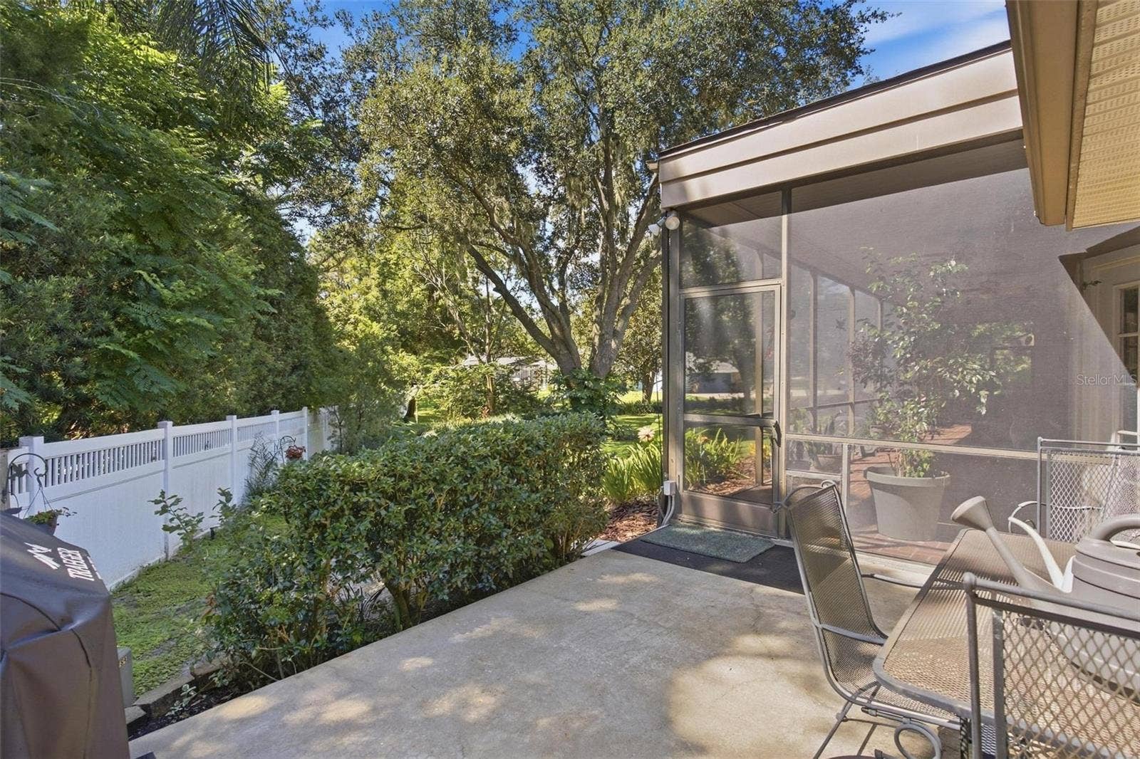 8732 SPRING COURT, Leesburg, FL 34788 Open Patio just off the screened enclosed lanai