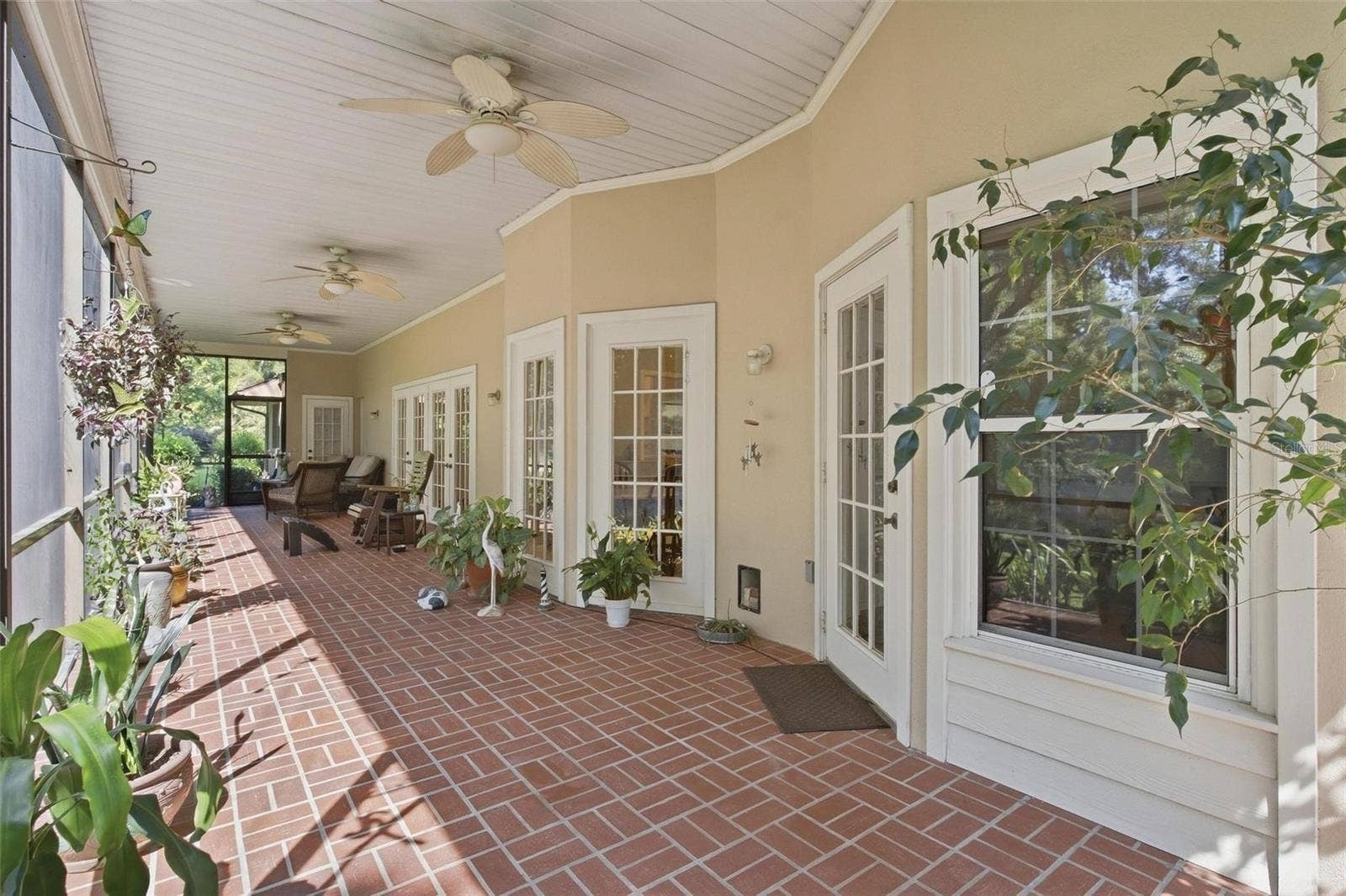 8732 SPRING COURT, Leesburg, FL 34788 50x9 extended screened enclosed lanai.