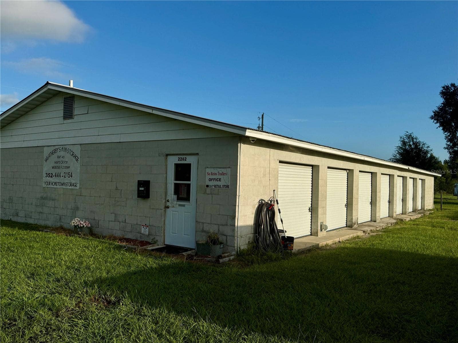 2262 E C-478, Webster, FL 33597 Entryway to office and side view of storage units