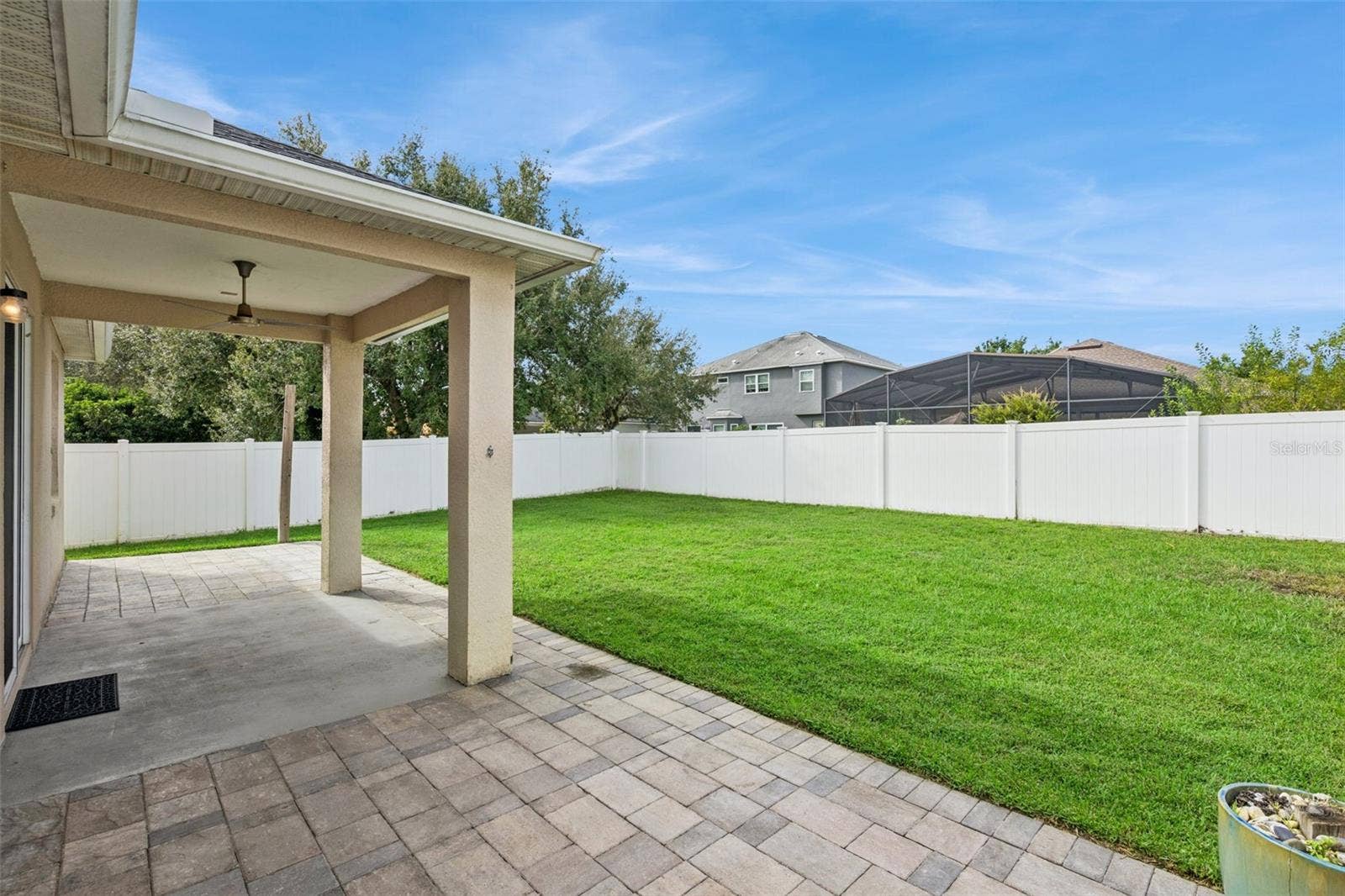 542 GROVES END LANE, Winter Garden, FL 34787 fenced backyard / covered lanai / extended patio