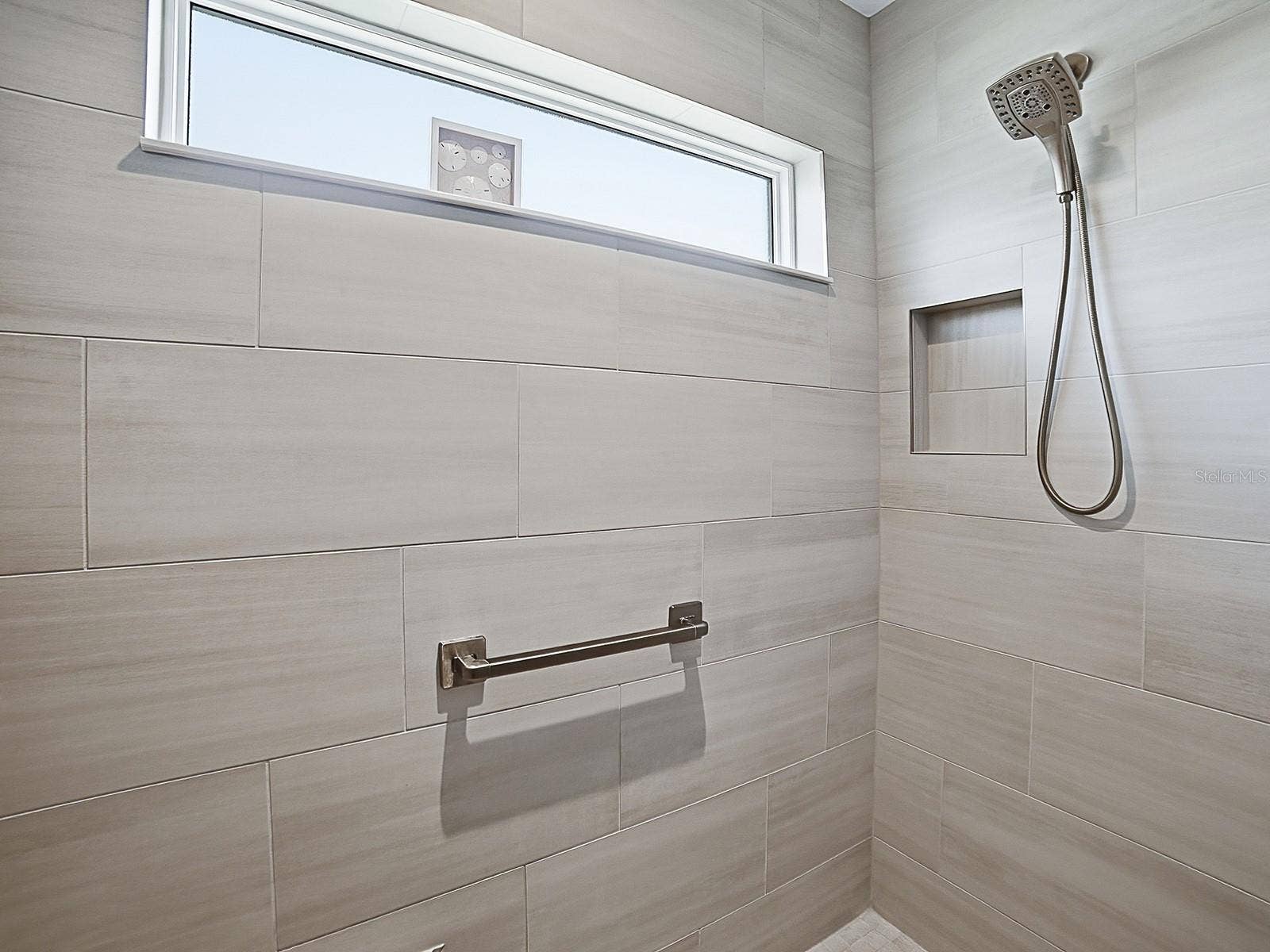 3075 LICCIARDELLO PATH, The Villages, FL 32163 LOVELY TILED SHOWER WITH A WINDOW.