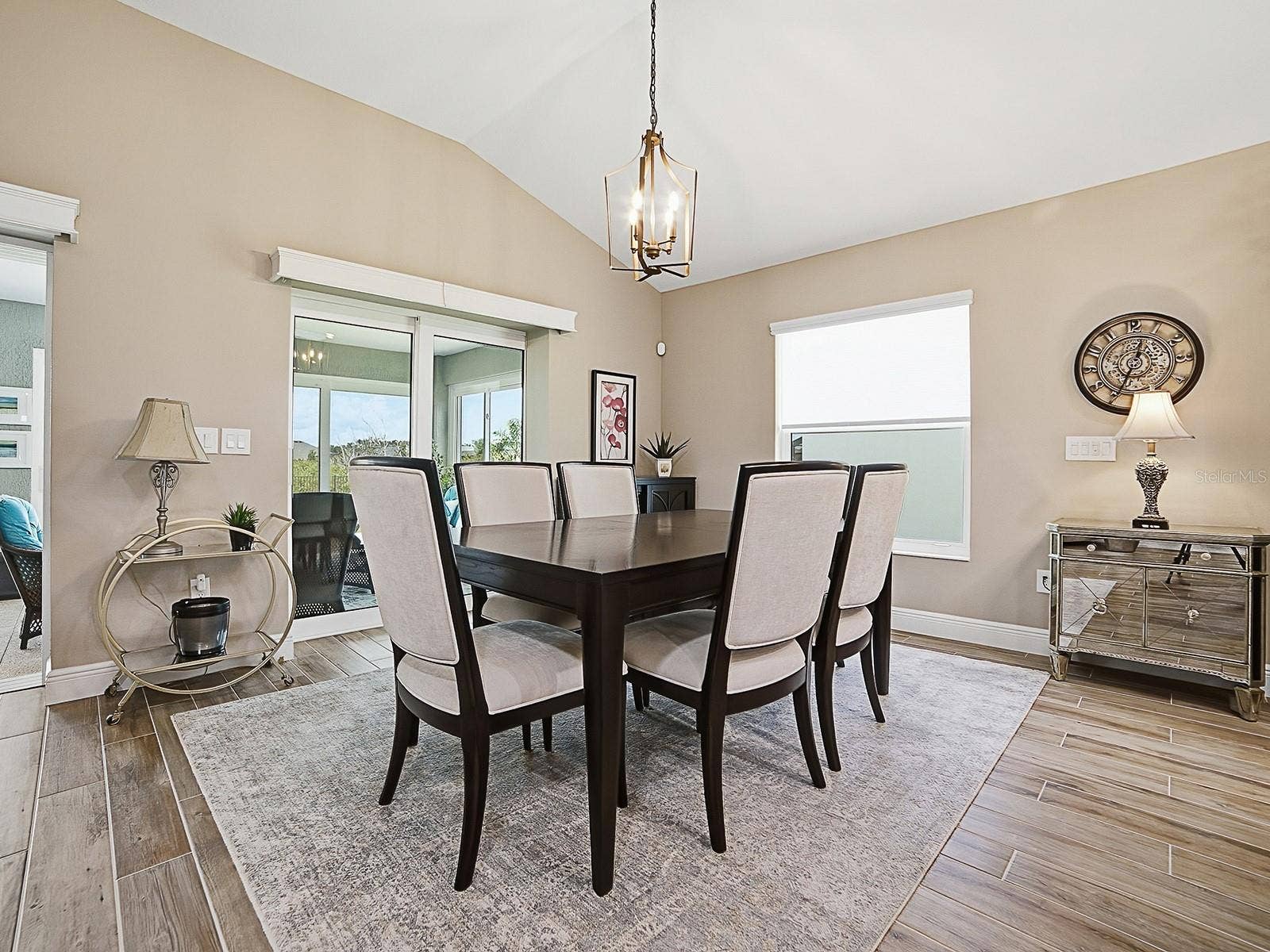 3075 LICCIARDELLO PATH, The Villages, FL 32163 LIGHT AND BRIGHT WITH THE LARGE WINDOW AND STACKBACK SLIDING GLASS DOORS THAT OPEN TO THE FLORIDA ROOM OFFERING A GREAT VIEW OF THE PRESERVE.