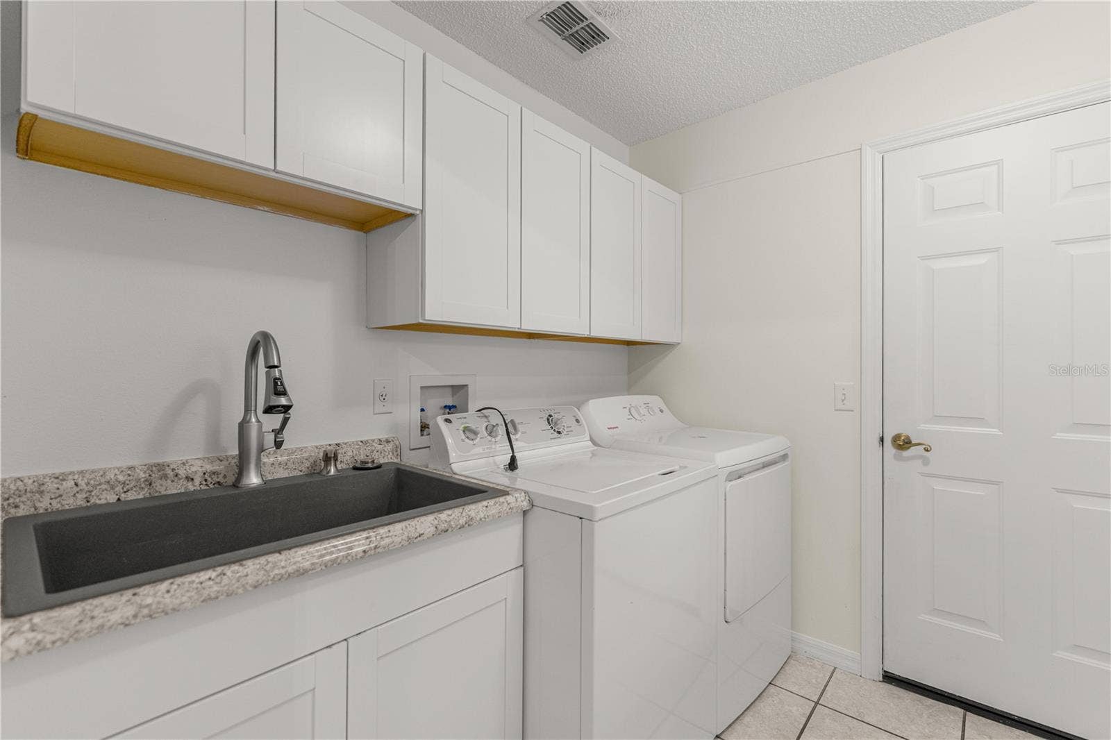 1232 CABELLA CIRCLE, The Villages, FL 32159 Inside Laundry Room