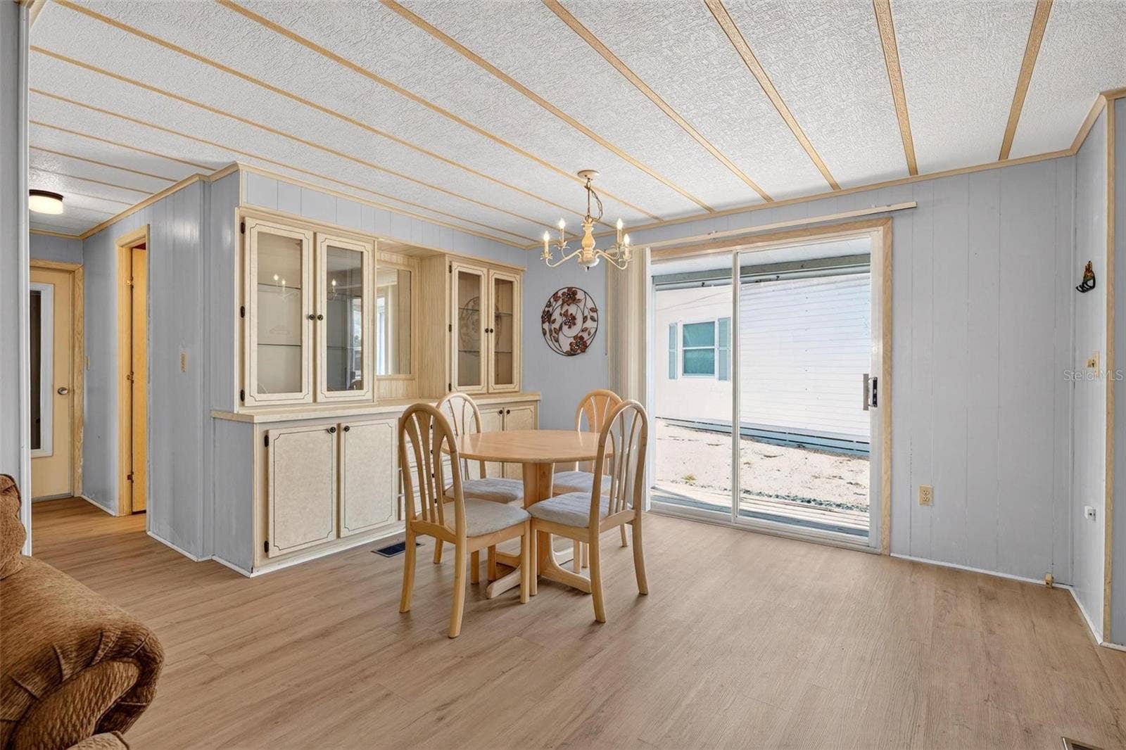 709 BENGAL AVENUE, Tavares, FL 32778 Dining Room access to rear deck