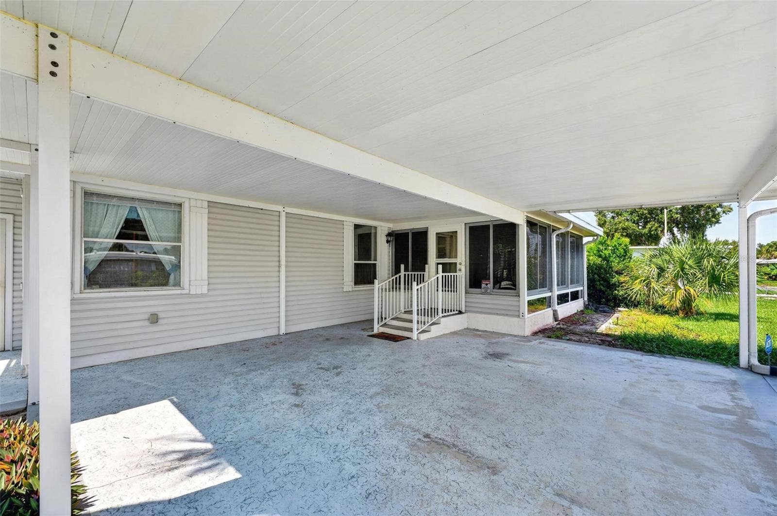 709 BENGAL AVENUE, Tavares, FL 32778 Double Carport