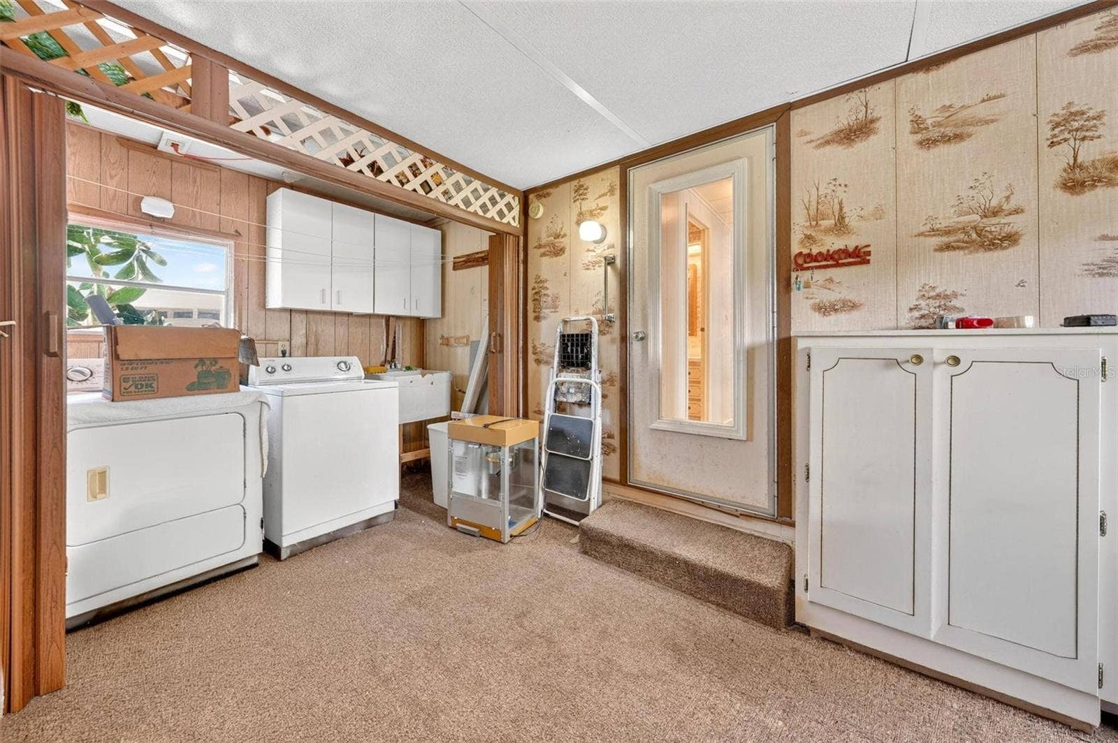 709 BENGAL AVENUE, Tavares, FL 32778 Attached Laundry/Storage Room