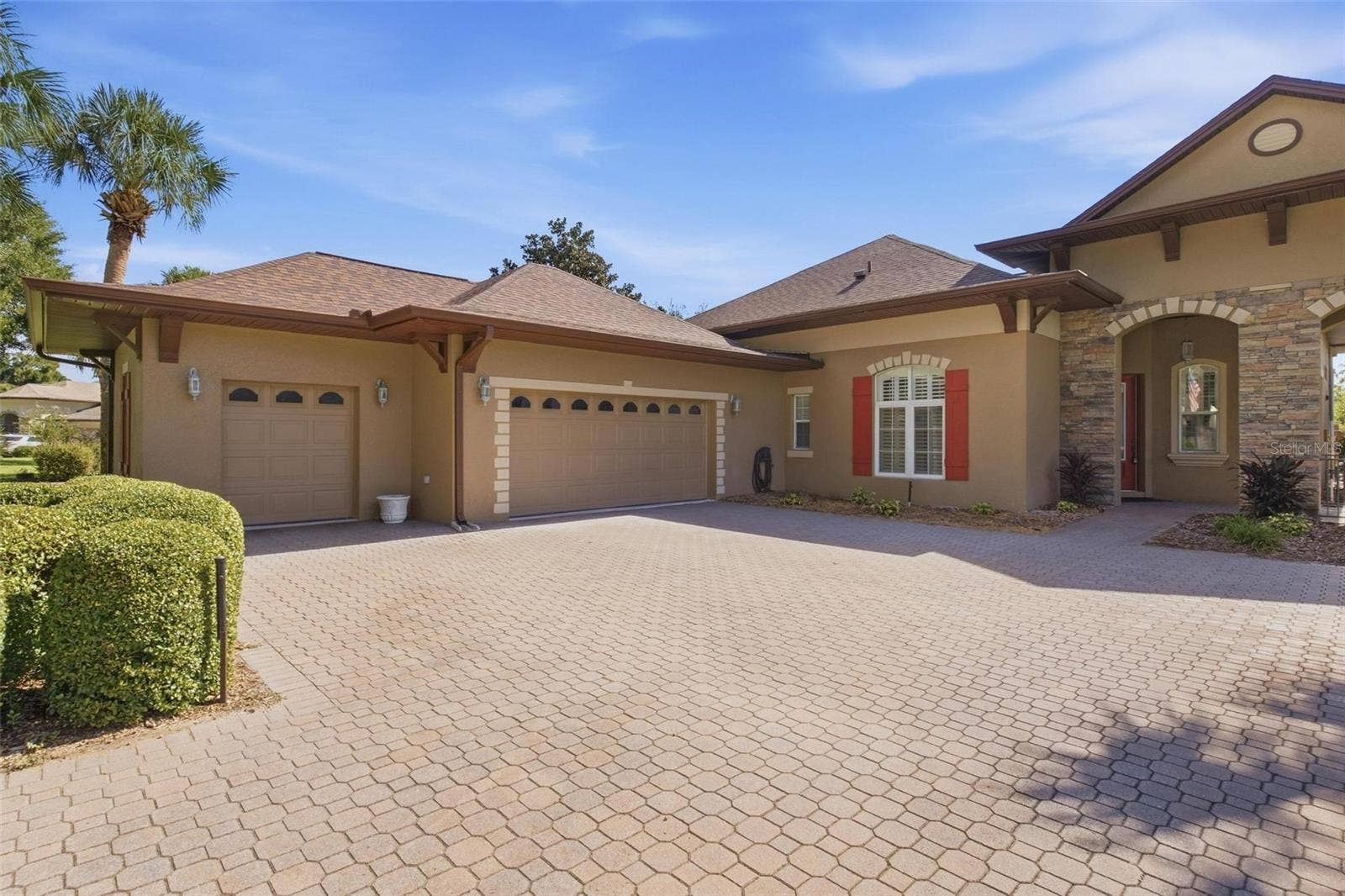 39118 GRIFFIN LANDING, Lady Lake, FL 32159 Exterior of home with beautiful shutters.