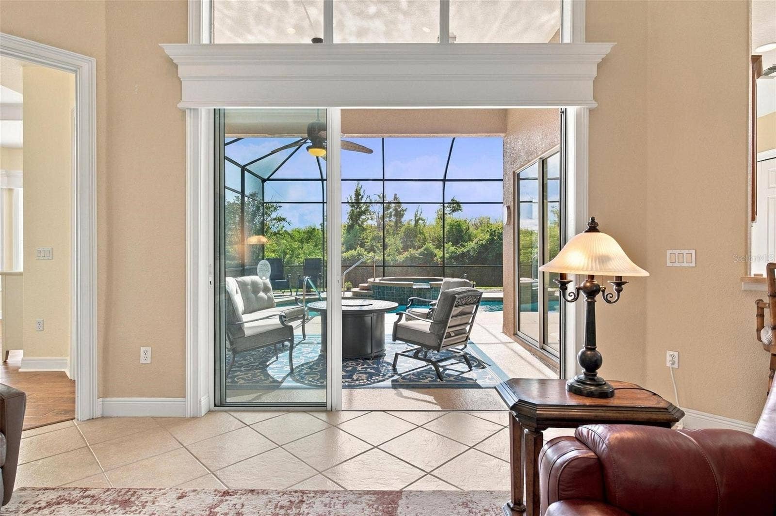 39118 GRIFFIN LANDING, Lady Lake, FL 32159 View of pool area from great room.