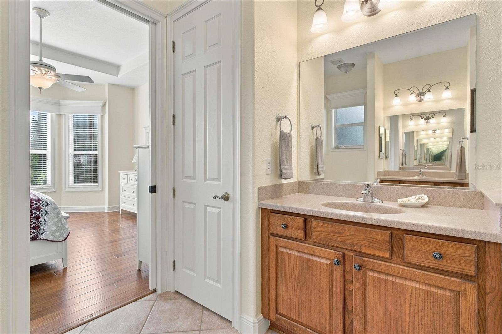 39118 GRIFFIN LANDING, Lady Lake, FL 32159 Primary bathroom with closet space.