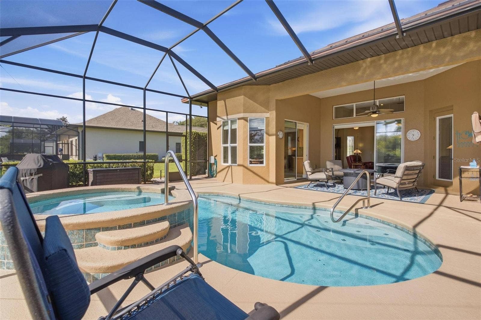 39118 GRIFFIN LANDING, Lady Lake, FL 32159 Beautiful heated pool and spa, with multiple places to relax.