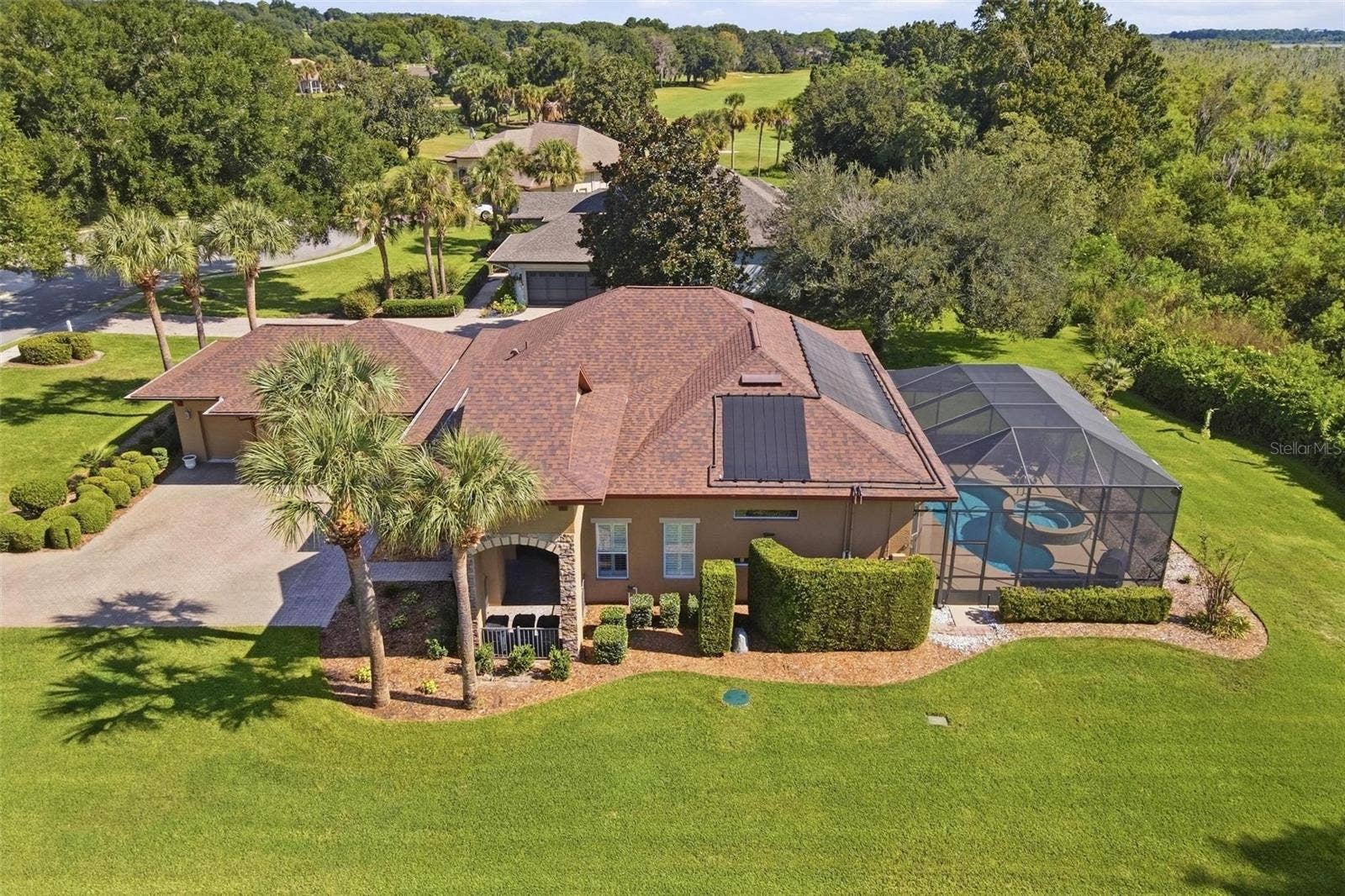 39118 GRIFFIN LANDING, Lady Lake, FL 32159 Ariel of side of home.