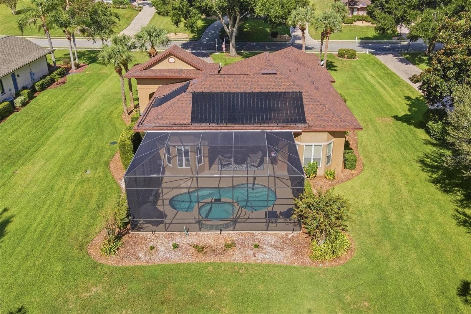 39118 GRIFFIN LANDING, Lady Lake, FL 32159 Ariel of back of home and pool area.