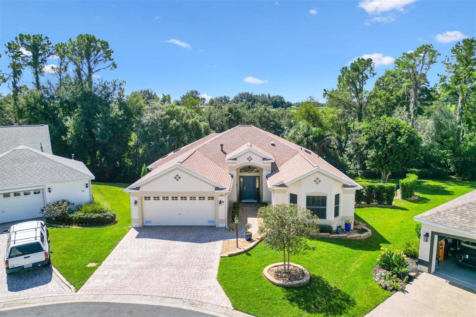 1302 LA ESTRELLITA WAY, The Villages, FL 32162 Aerial Front