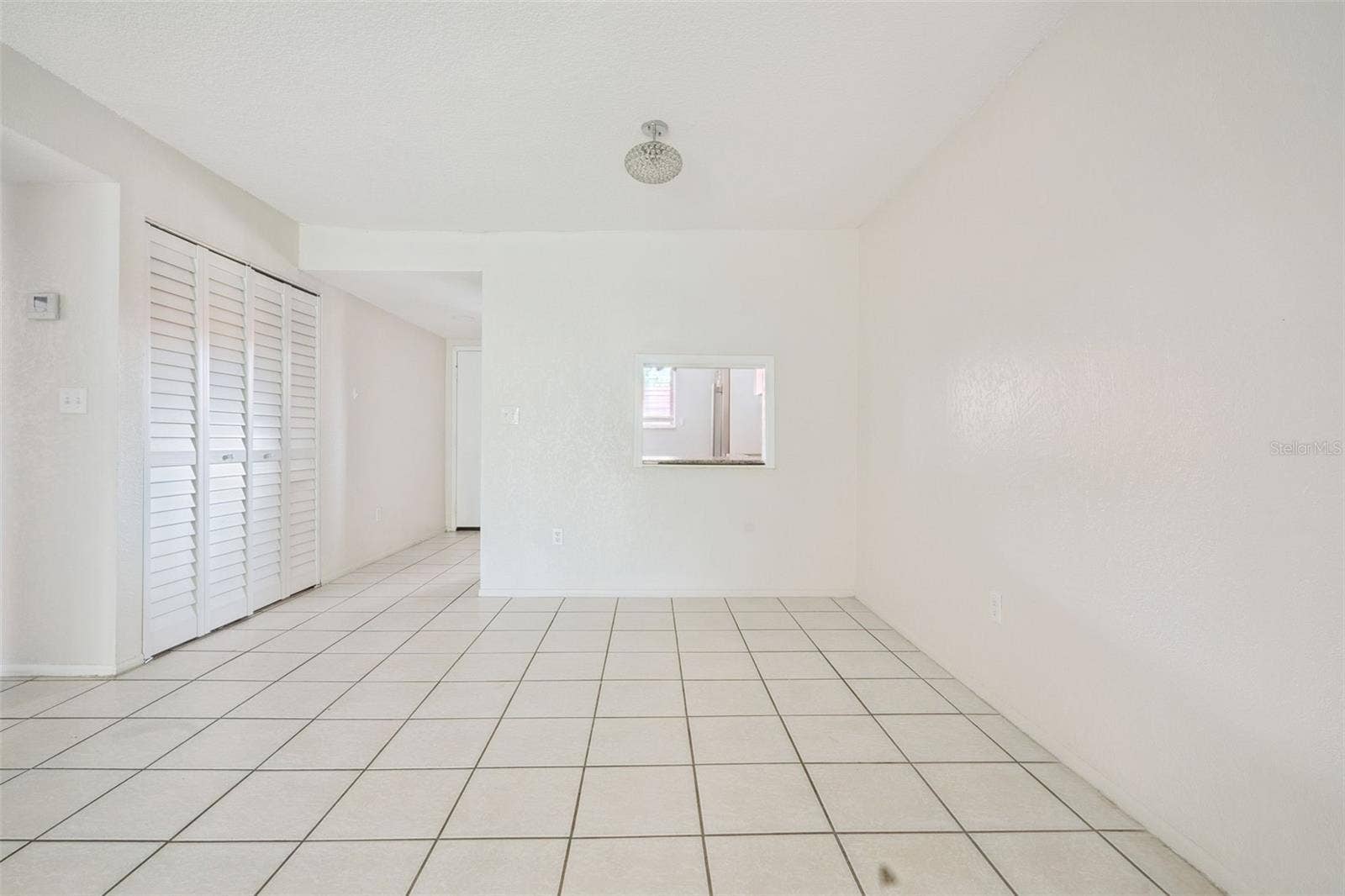 2856 N POWERS DRIVE, #115, Orlando, FL 32818 Living & Dining