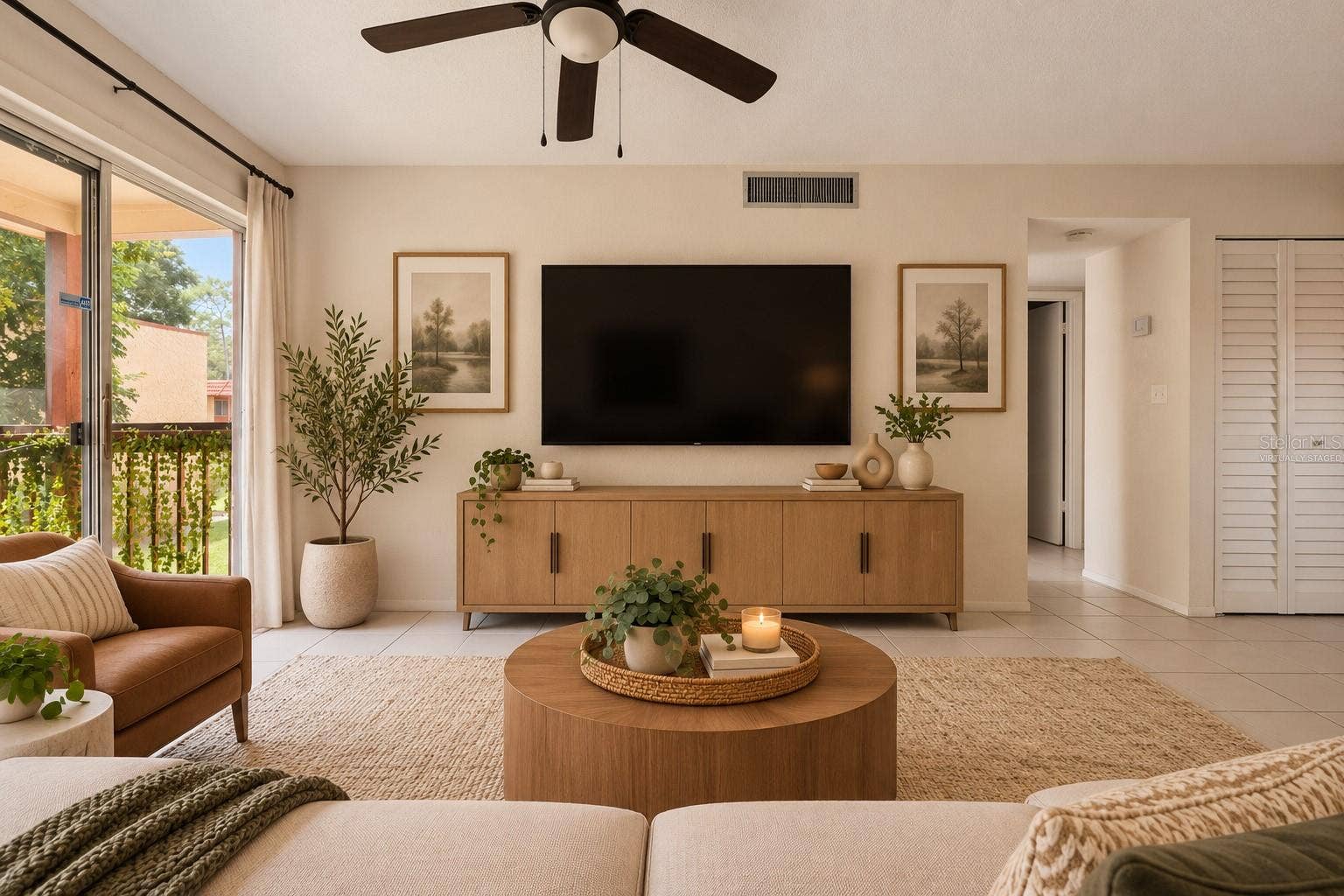 2856 N POWERS DRIVE, #115, Orlando, FL 32818 Living Room - Virtually Staged