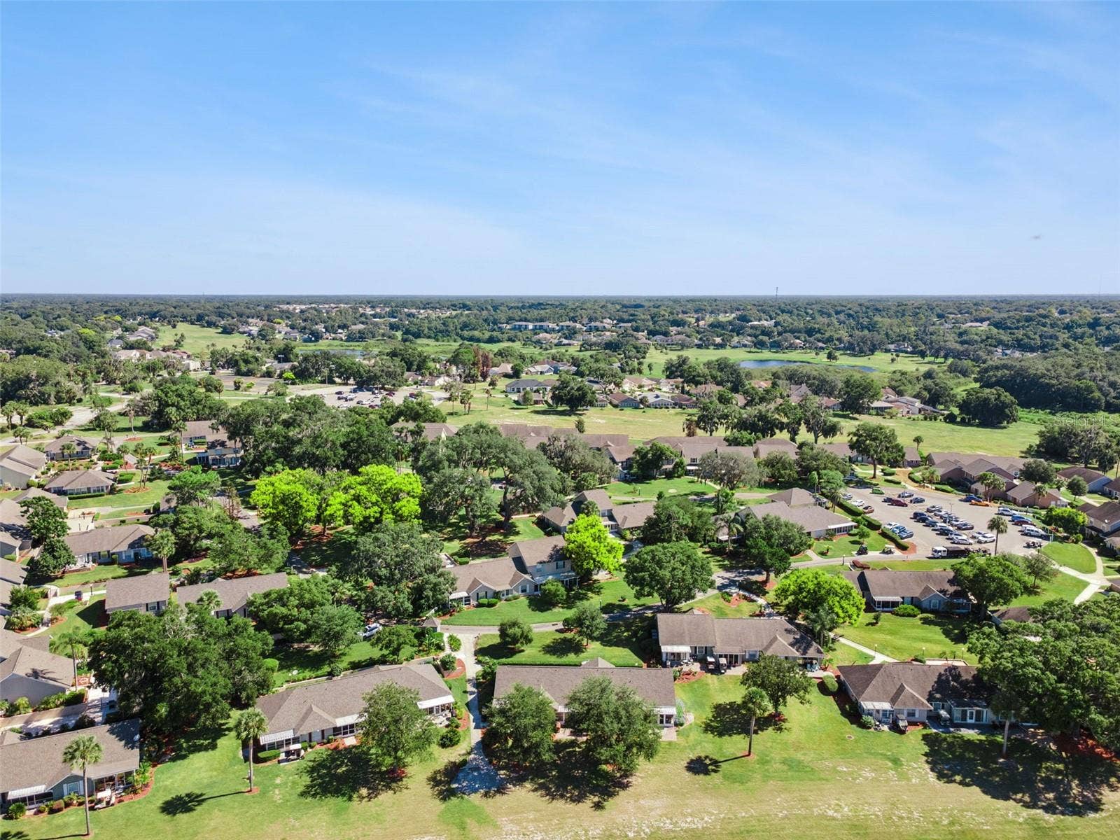 1066 VILLA LANE, #63, Apopka, FL 32712 Golf carts are welcome to meander through the community's mature trees and gently rolling grounds.