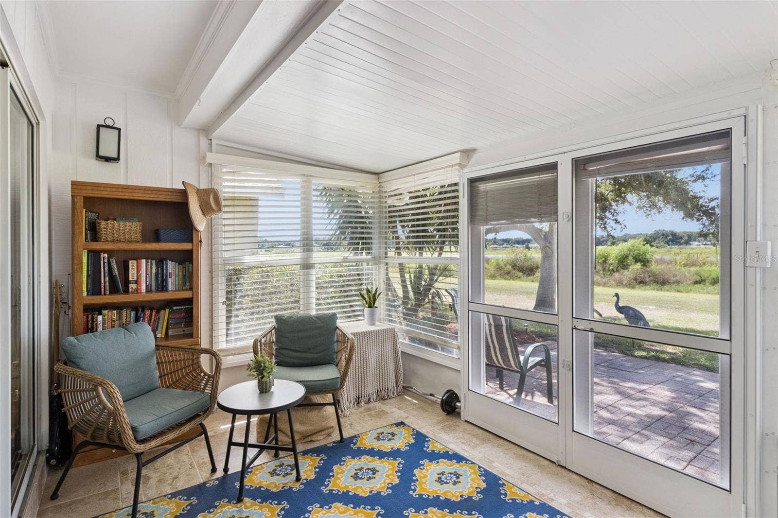 1066 VILLA LANE, #63, Apopka, FL 32712 French doors with center-opening screens lead to the patio when you want the breeze.