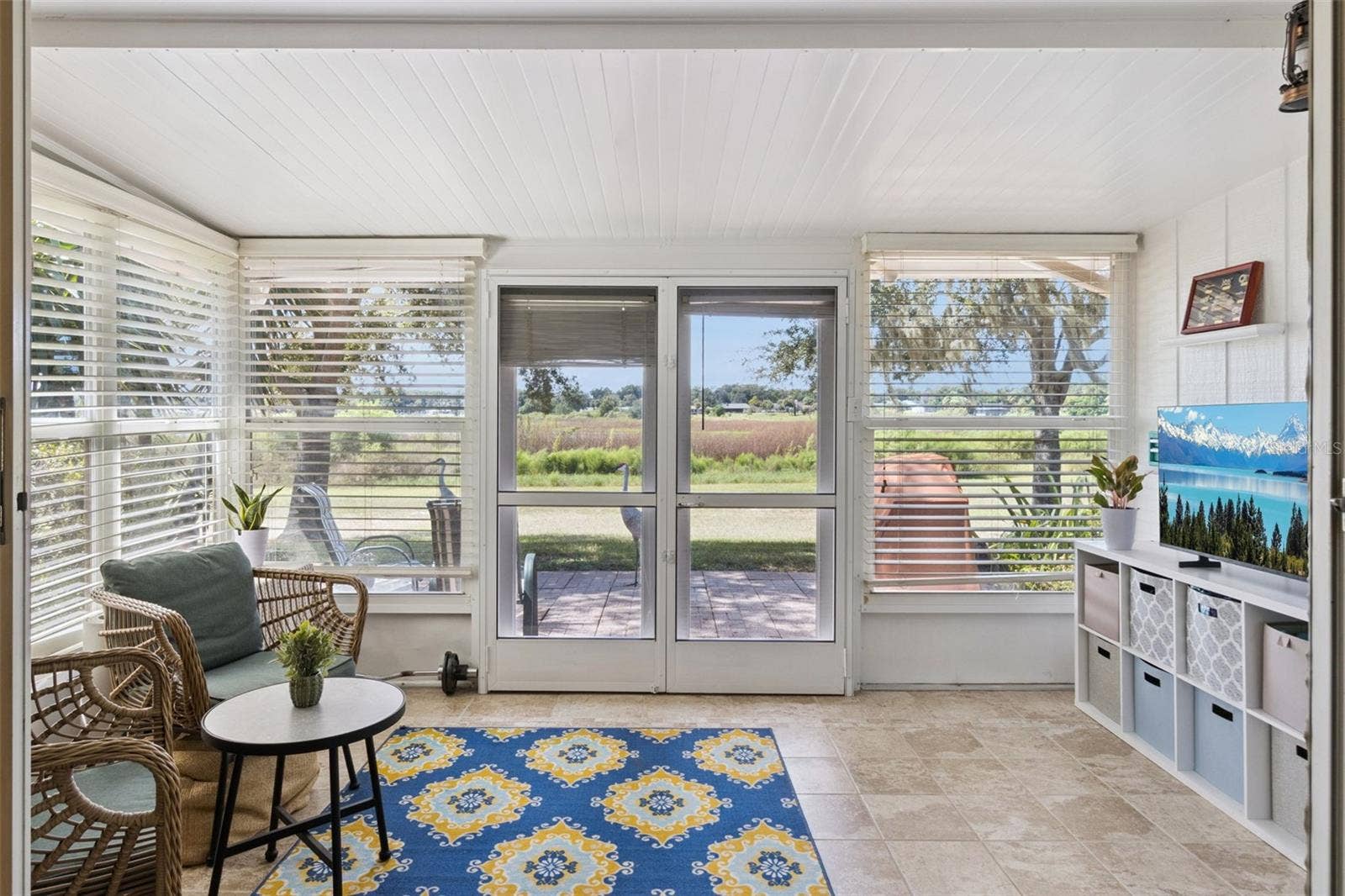1066 VILLA LANE, #63, Apopka, FL 32712 An entire "art wall" is an open vista and large lake view.