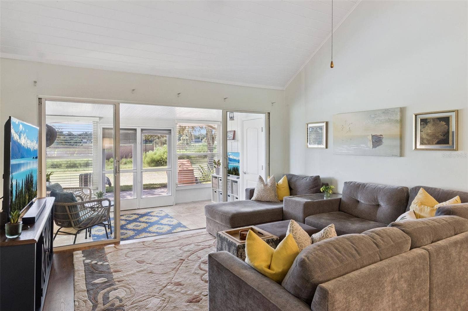 1066 VILLA LANE, #63, Apopka, FL 32712 Plenty of space for over-sized furniture in the open great room and sunroom.
