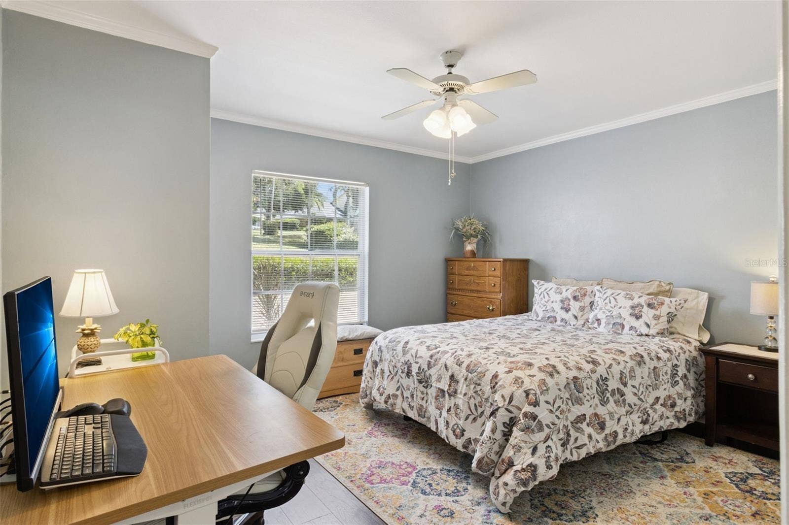 1066 VILLA LANE, #63, Apopka, FL 32712 Secondary bedroom also has crown molding and ceiling fan with lights.