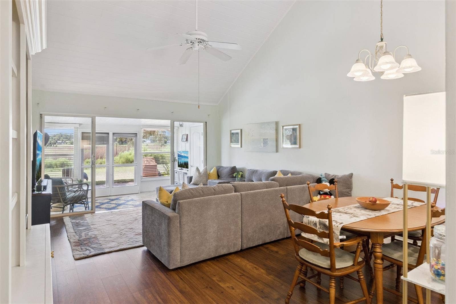 1066 VILLA LANE, #63, Apopka, FL 32712 Cathedral ceiling and no carpeting add to the polished feeling of this home.