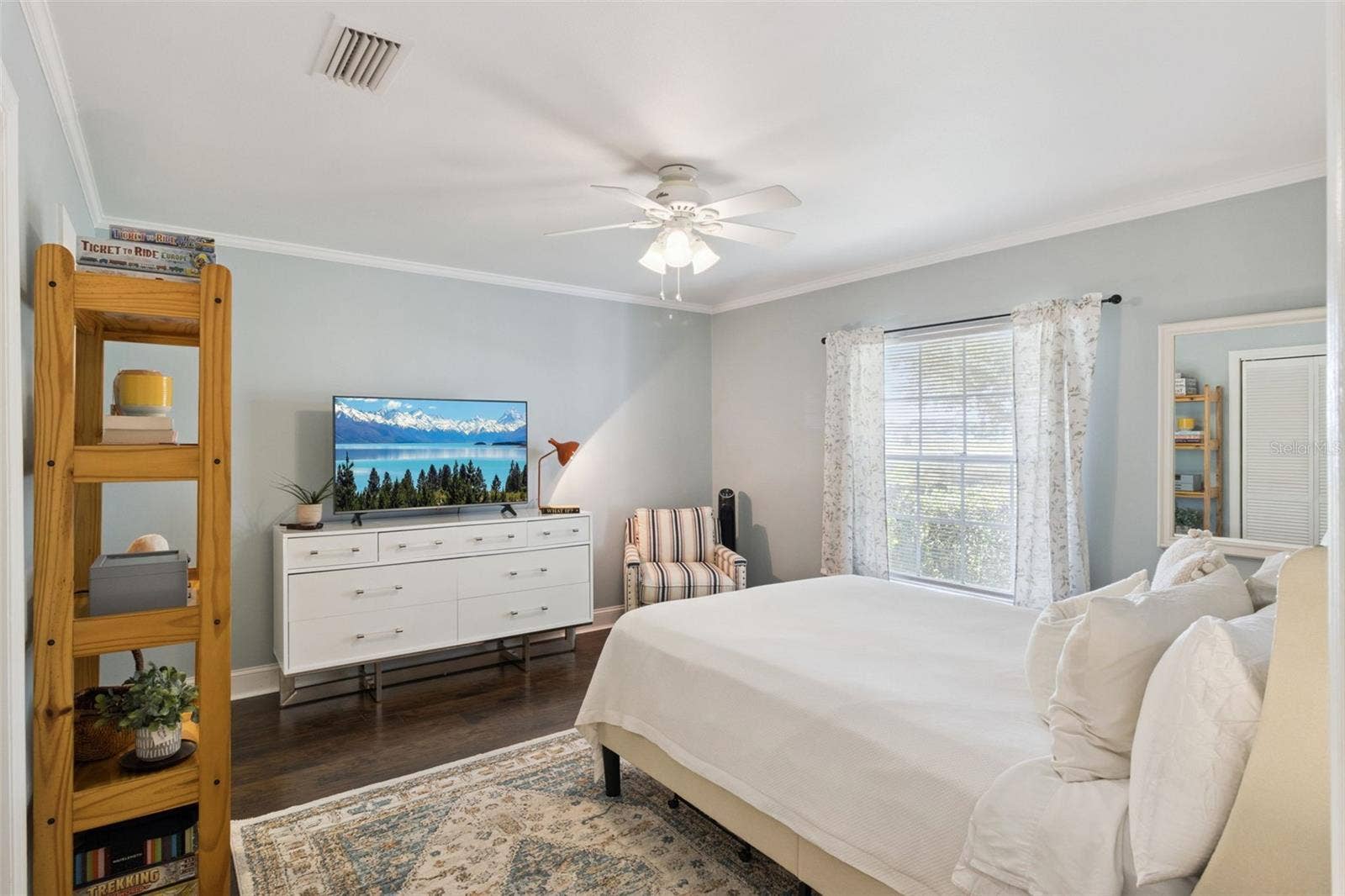 1066 VILLA LANE, #63, Apopka, FL 32712 The roomy primary bedroom space includes a cozy reading nook.