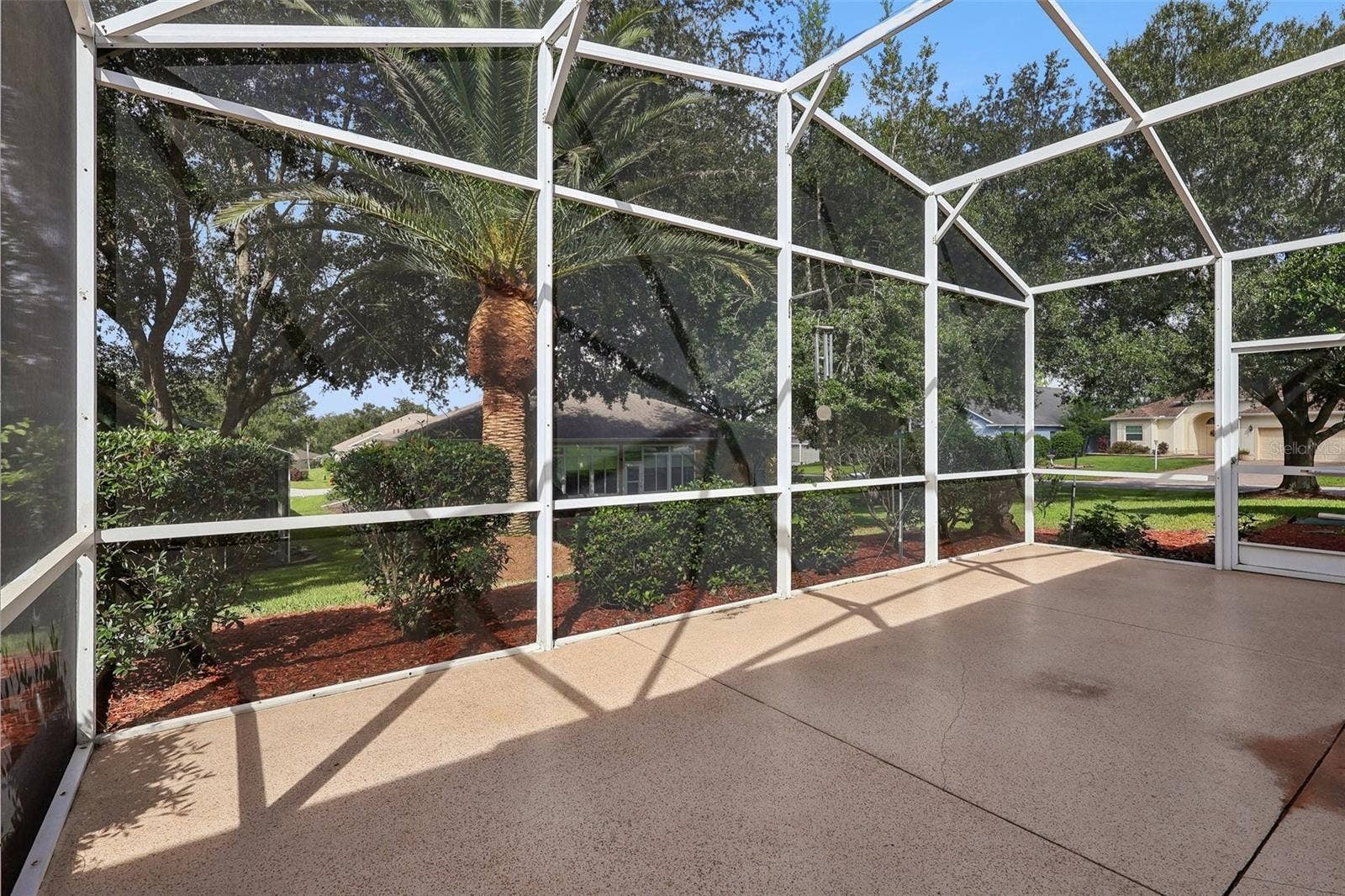 24445 MADEWOOD AVENUE, Leesburg, FL 34748 Screened Patio - Great for outdoor living without the bugs