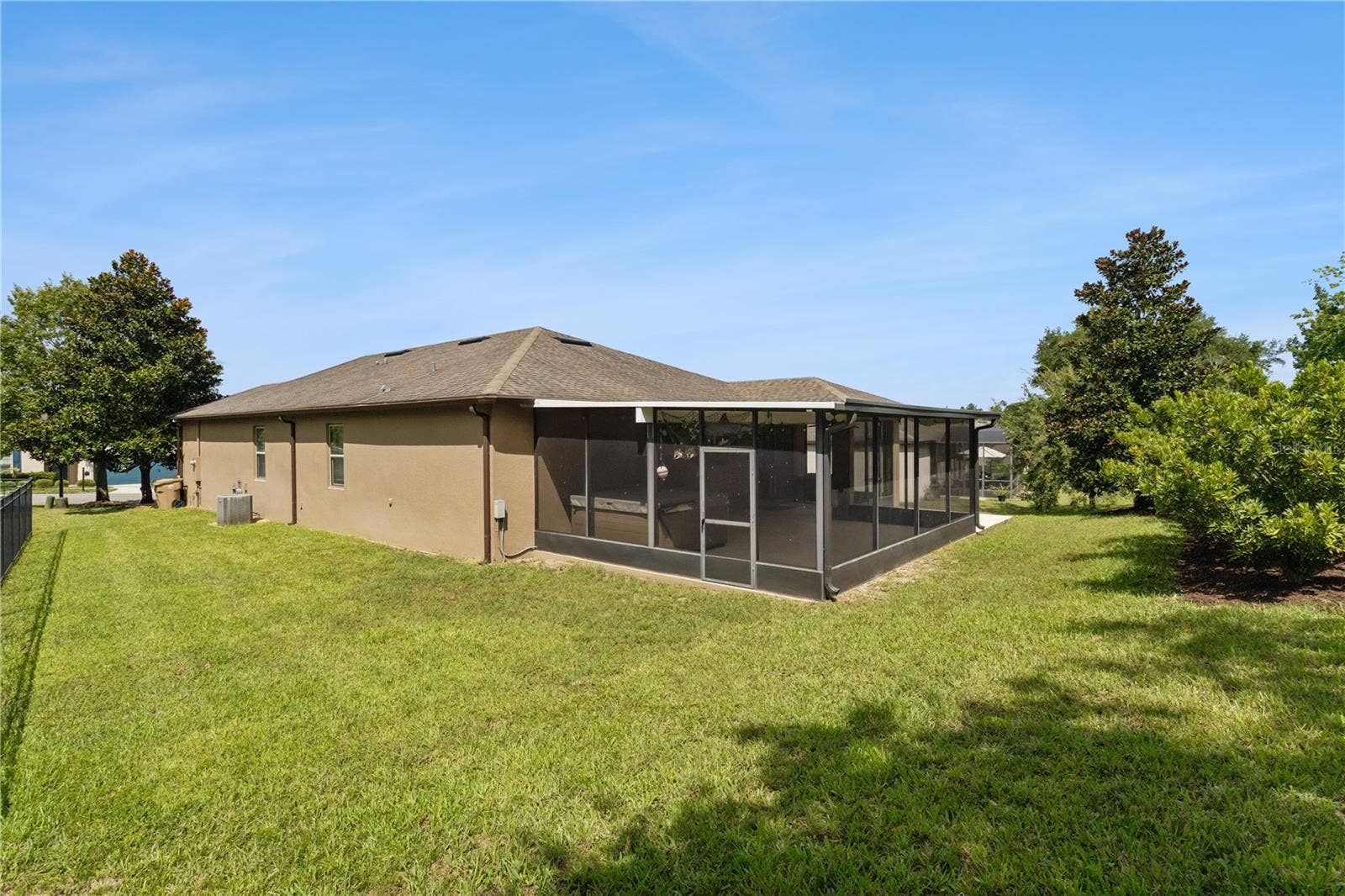30022 DONNINGTON LOOP, Mount Dora, FL 32757 Another view of the spacious patio and back yard