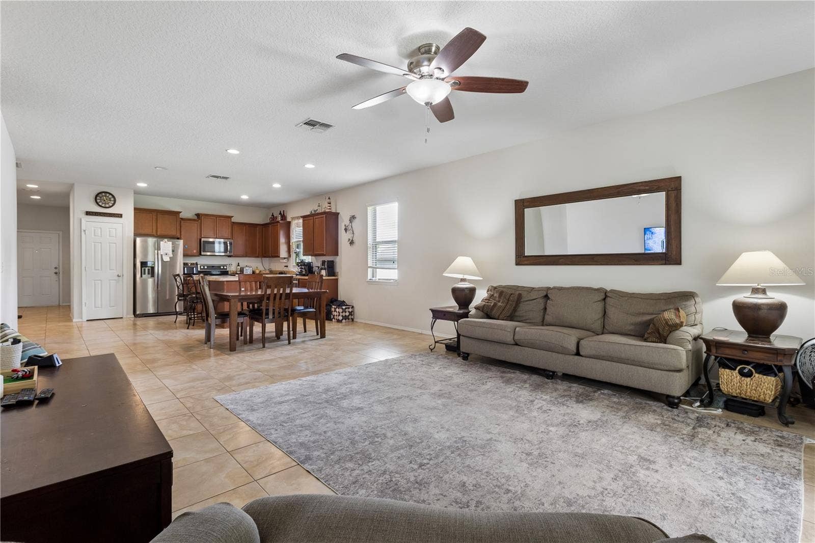 30022 DONNINGTON LOOP, Mount Dora, FL 32757 Open concept for the kitchen, dining and family rooms.