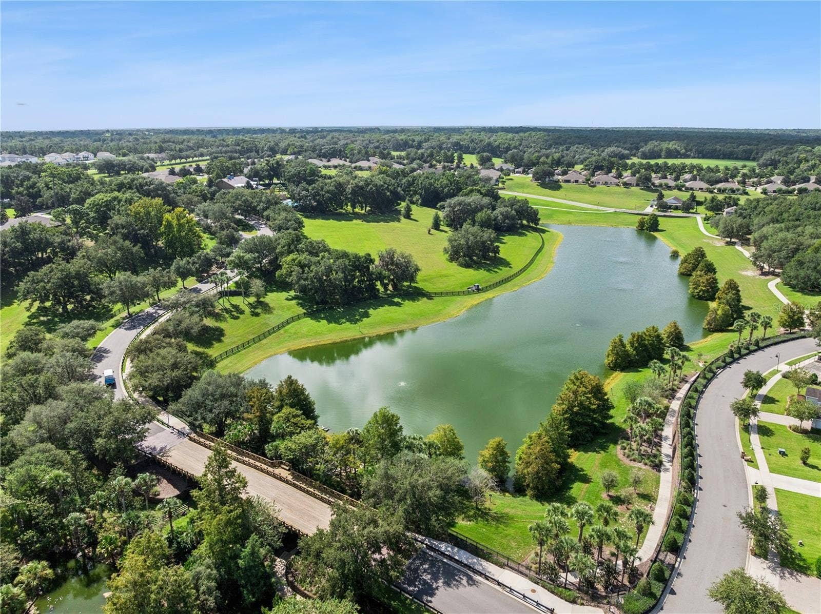 30022 DONNINGTON LOOP, Mount Dora, FL 32757 Majestic entry into Sullivan Ranch and the bridge over the waterway.