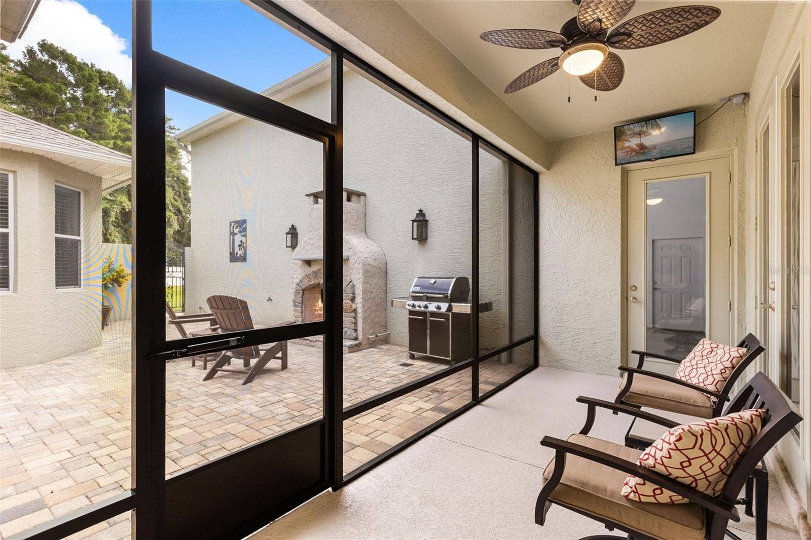 4711 HERITAGE TRAIL, Leesburg, FL 34748 Screened Lanai Overlooking Private Courtyard