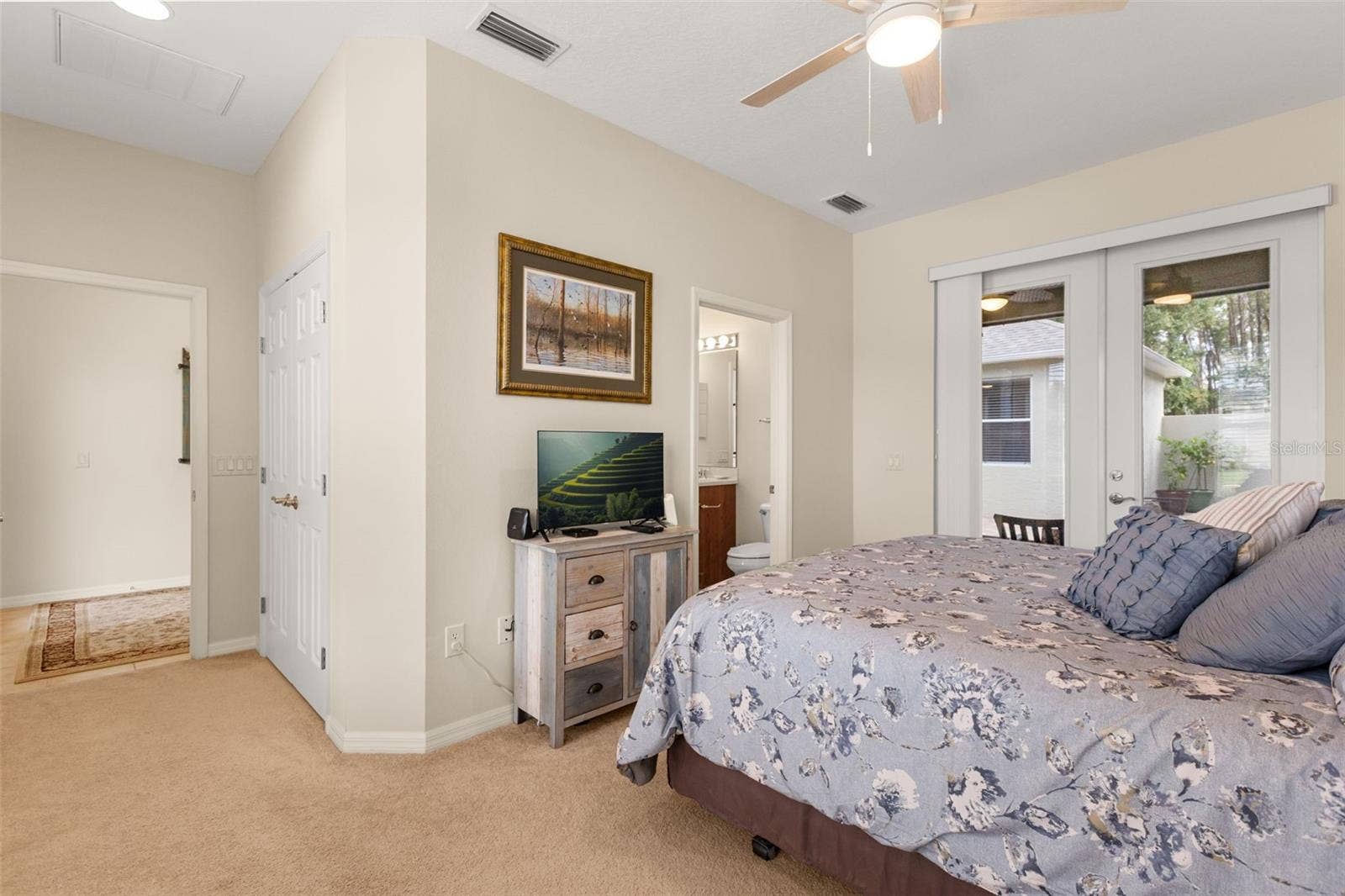 4711 HERITAGE TRAIL, Leesburg, FL 34748 Second Bedroom with Ensuite Bath and Lanai Access