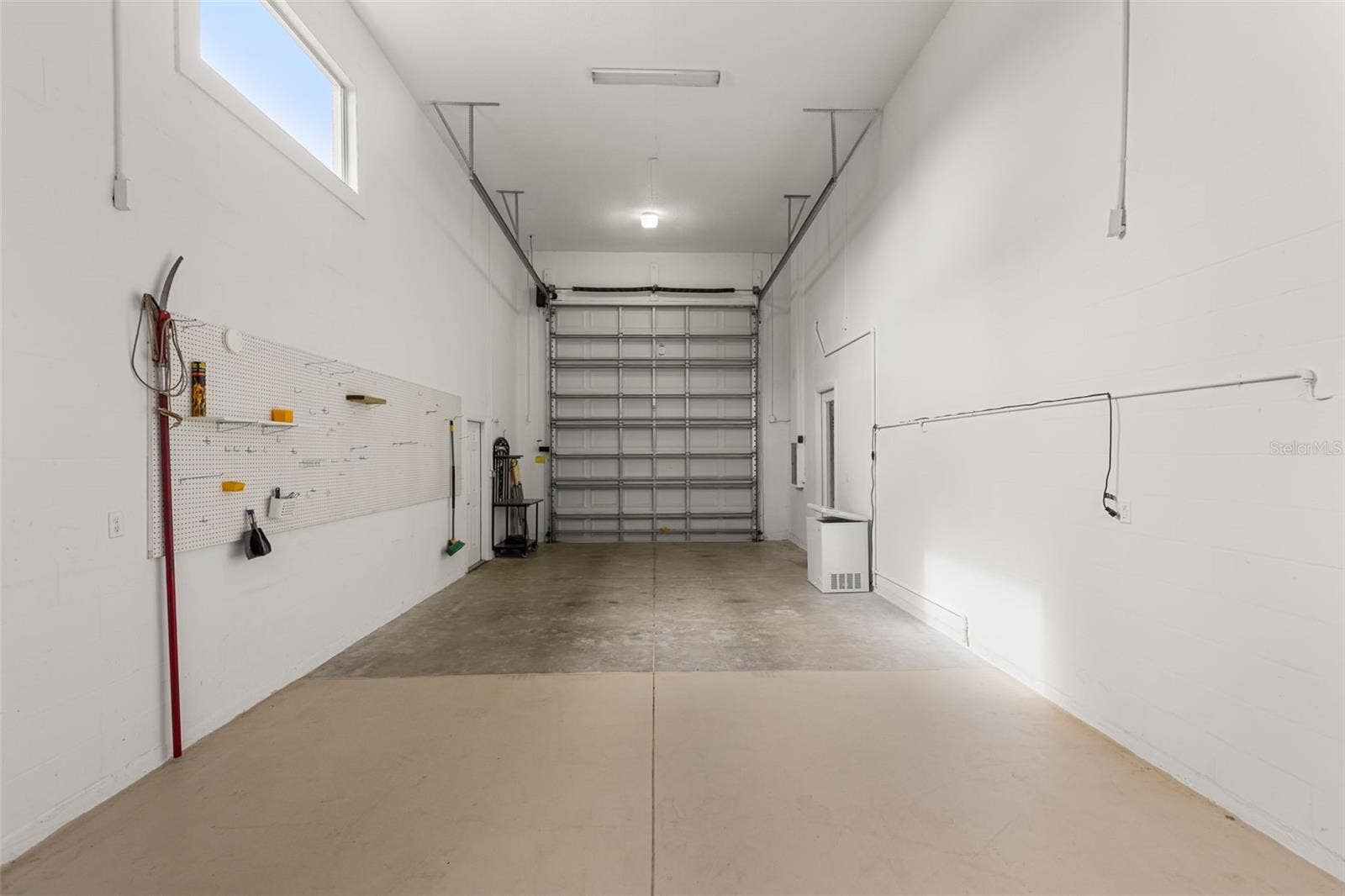 4711 HERITAGE TRAIL, Leesburg, FL 34748 RV Garage with Tall Overhead Door
