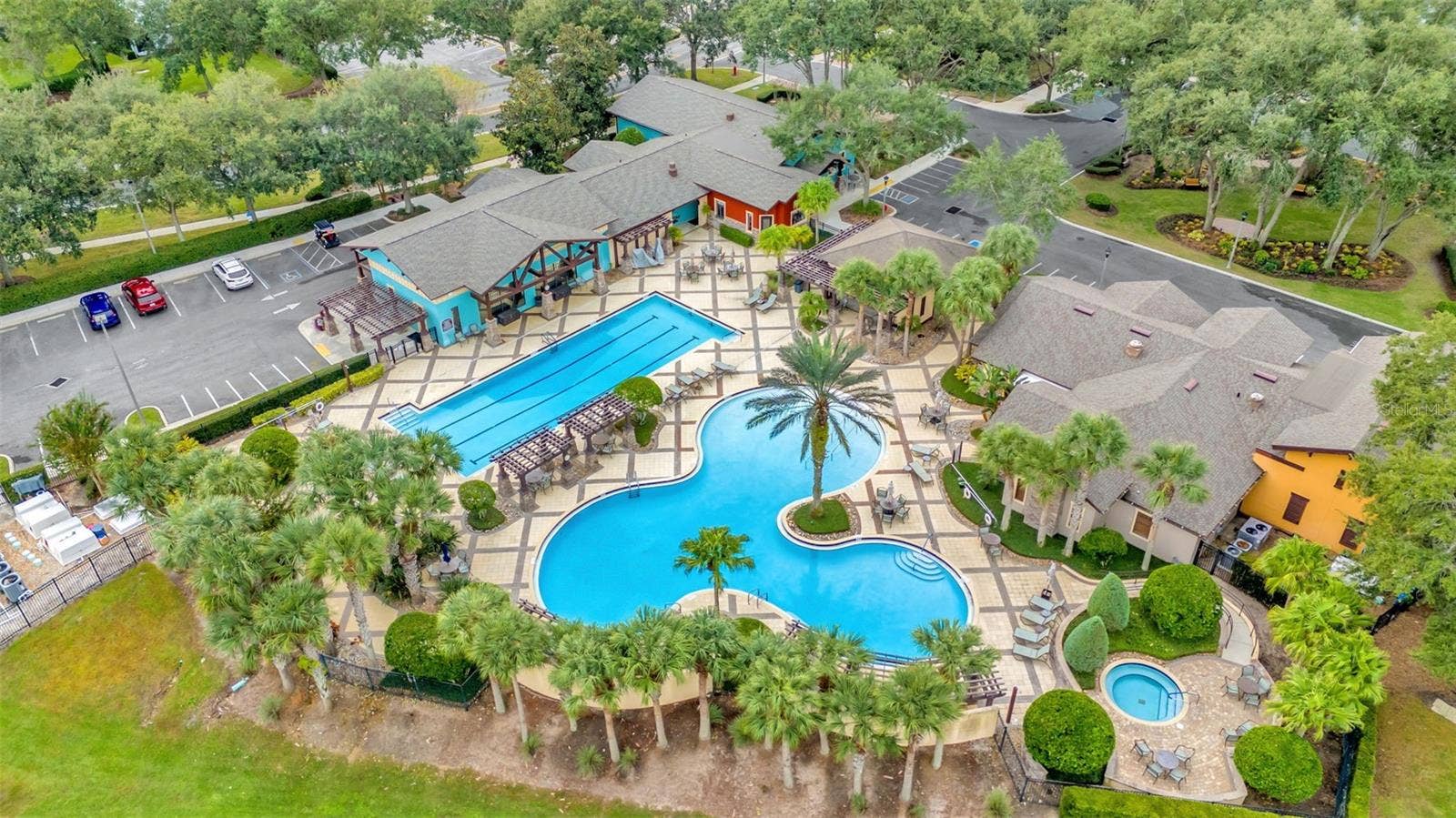 4711 HERITAGE TRAIL, Leesburg, FL 34748 Aerial View of Arlington Ridge Resort-Style Pool, Lap Pool & Spa