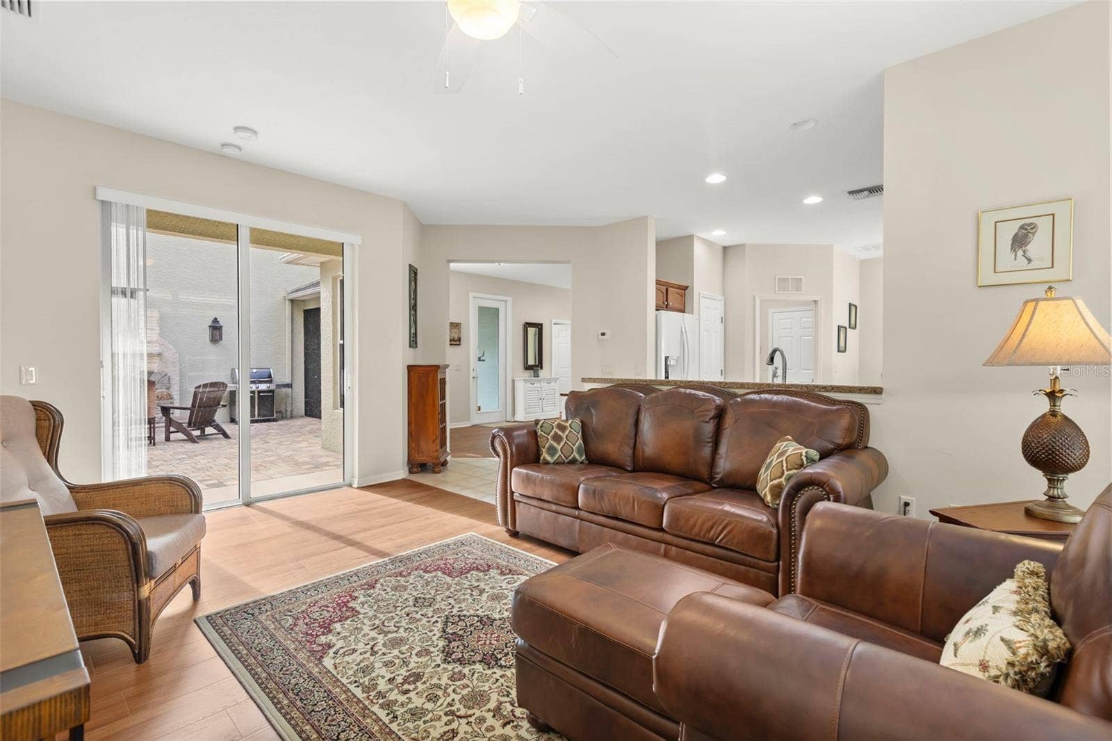 4711 HERITAGE TRAIL, Leesburg, FL 34748 Living Room with Open Flow to Kitchen and Bonus Room