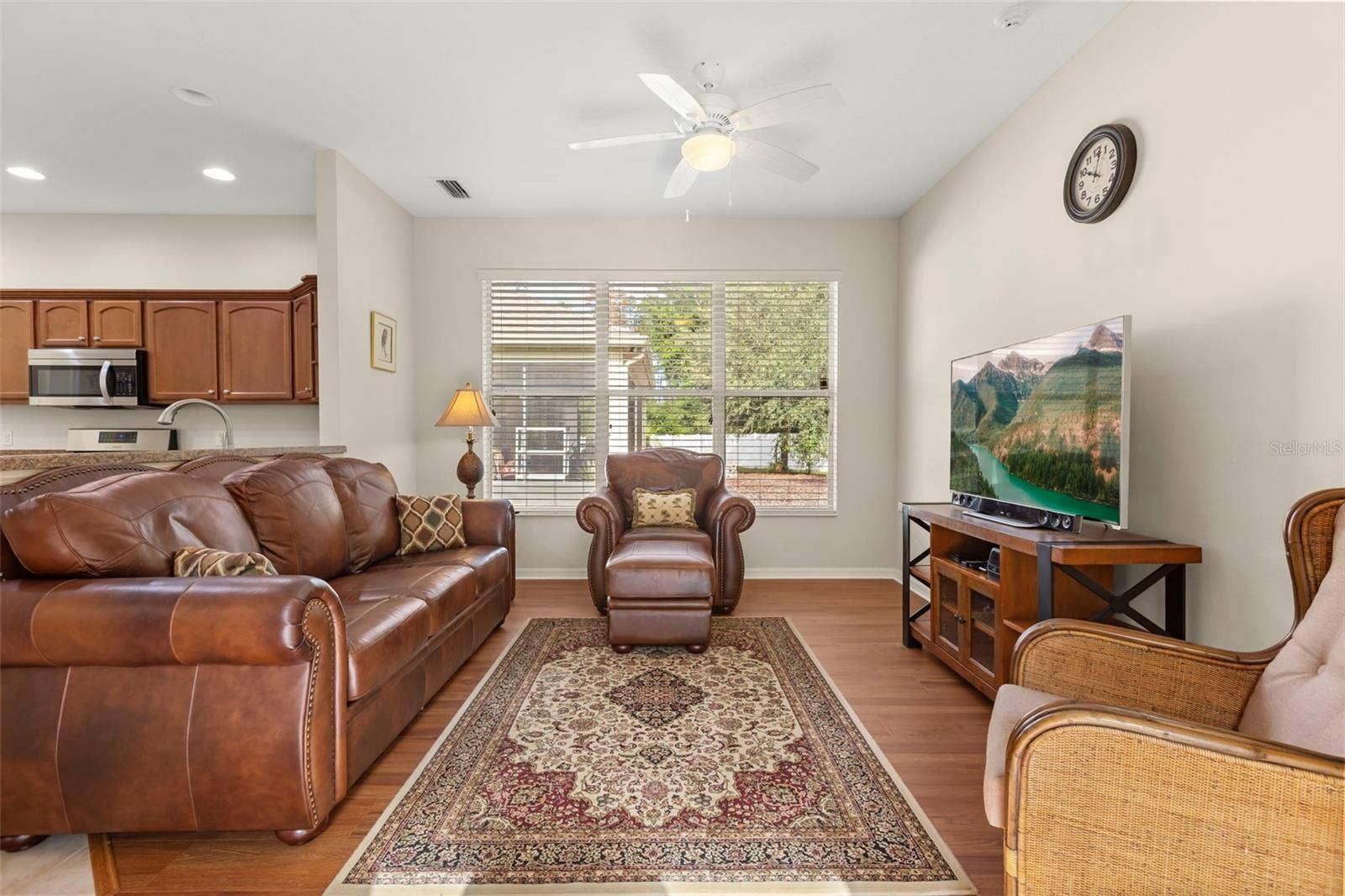 4711 HERITAGE TRAIL, Leesburg, FL 34748 Comfortable Living Room with Open View to Kitchen