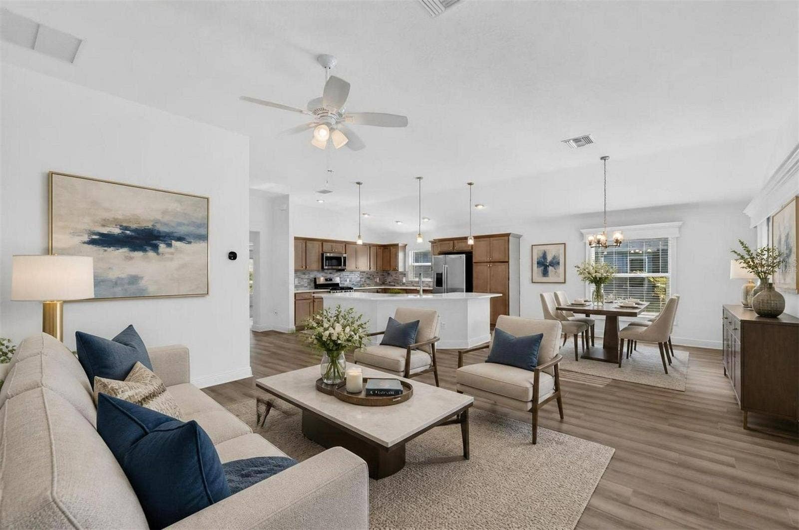 6996 DWIGHT DRIVE, The Villages, FL 34762 Living, Dining, and Kitchen-Virtually Staged
