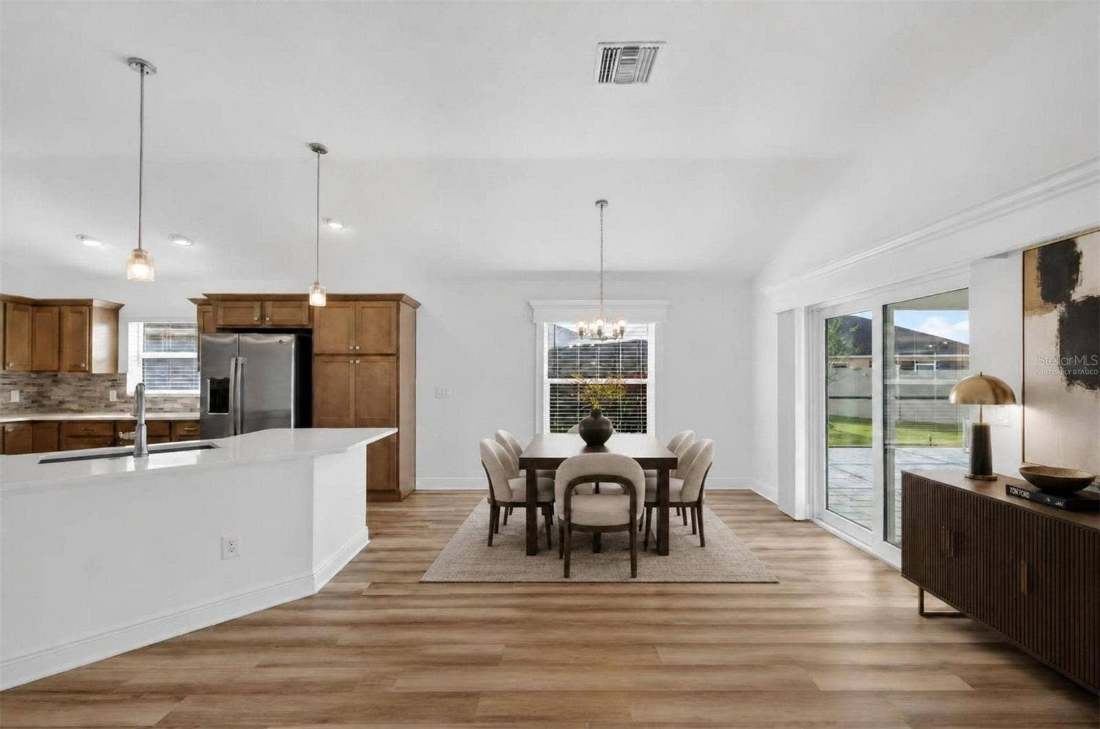 6996 DWIGHT DRIVE, The Villages, FL 34762 Kitchen and Dining Room-Virtually Staged